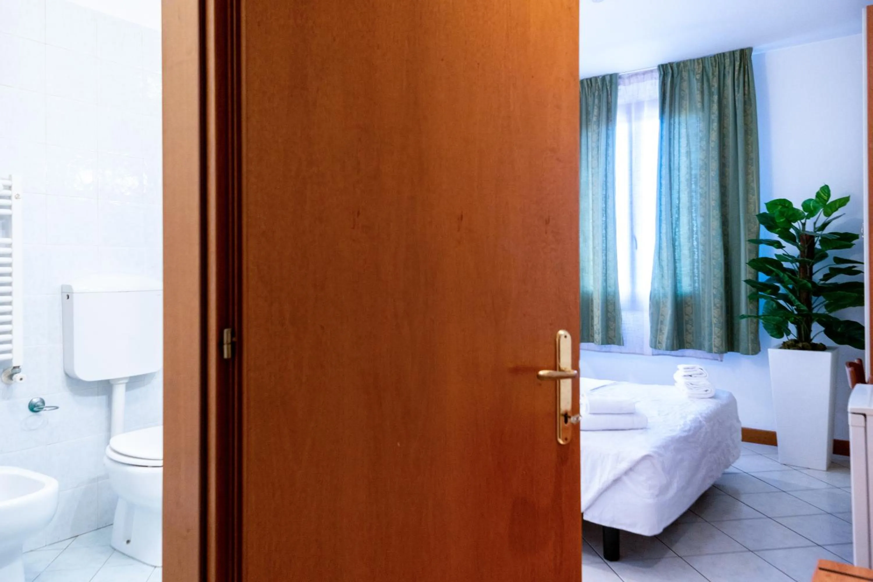 Bed in Hotel New Aurora Venice