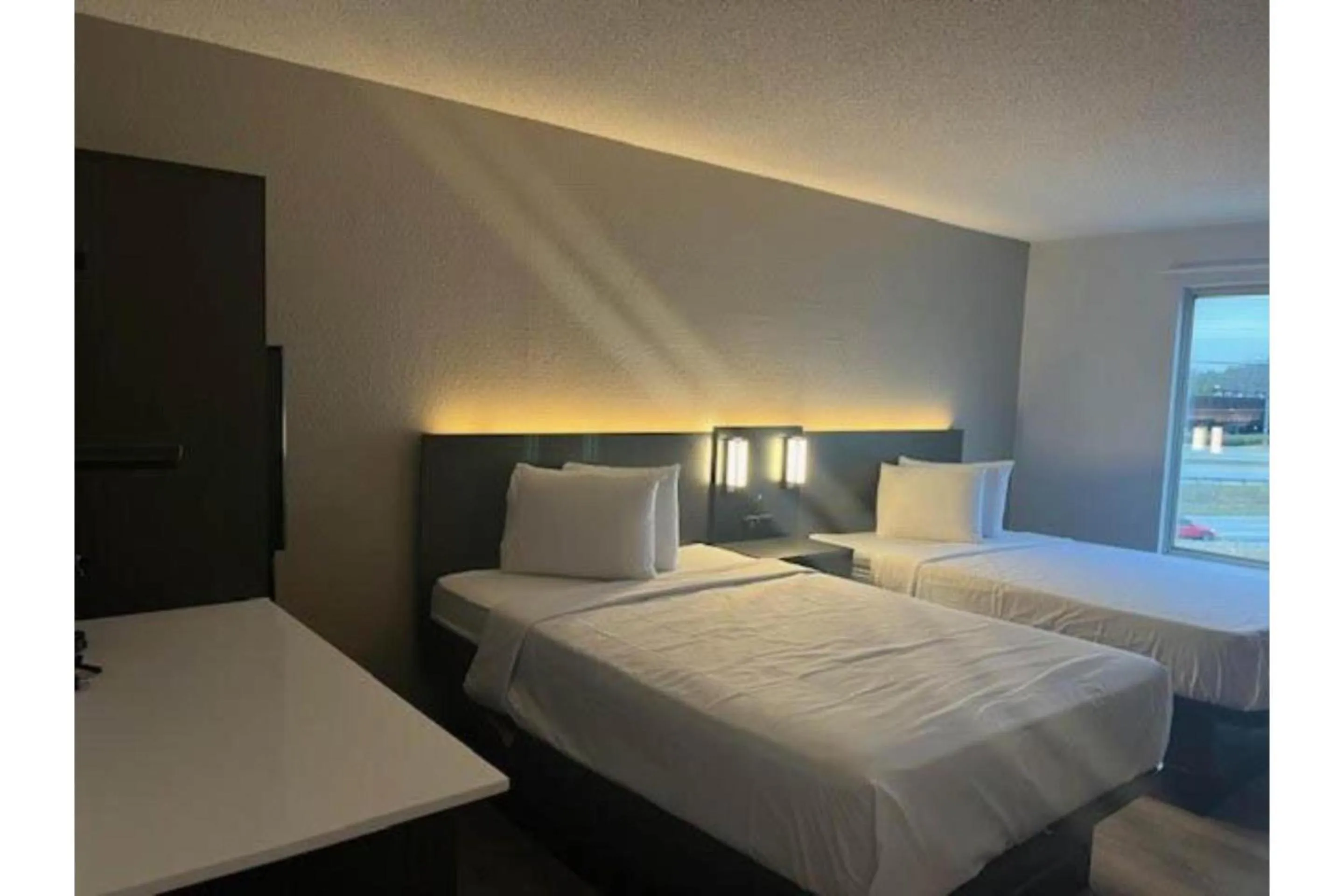 Bedroom, Bed in Studio 6 Suites Norcross, GA