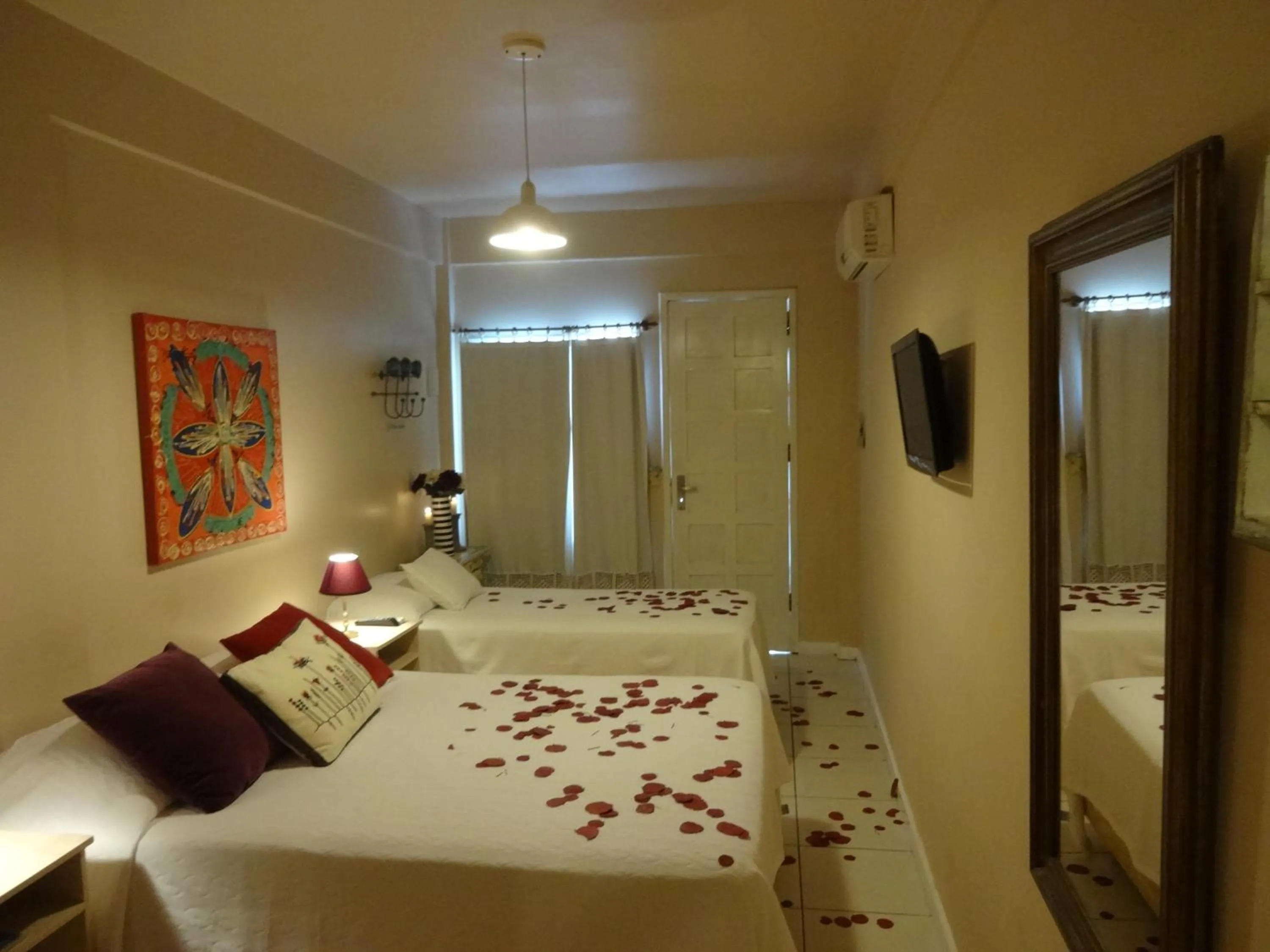 Bed in Pousada Via Brasil