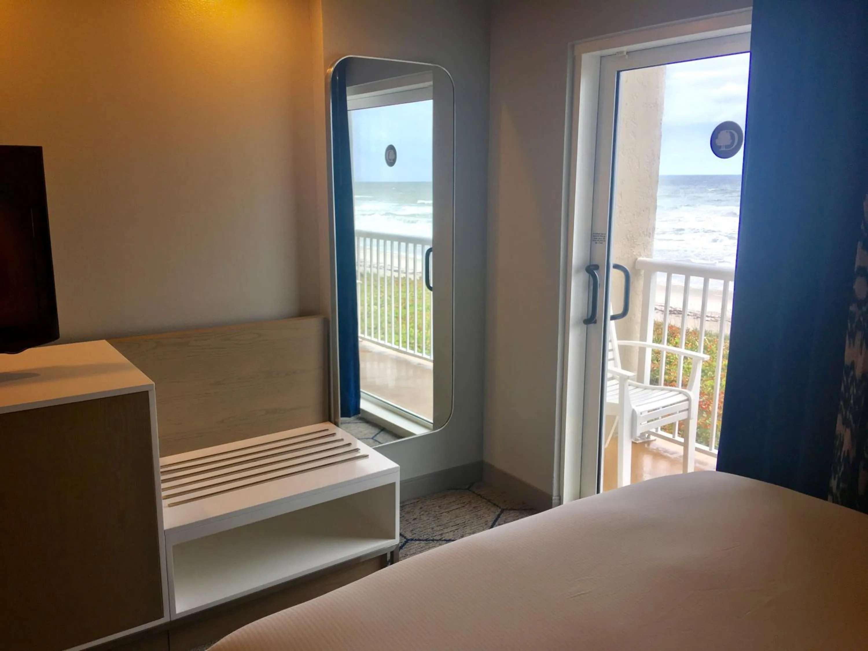 Bed in DoubleTree Suites by Hilton Melbourne Beach Oceanfront