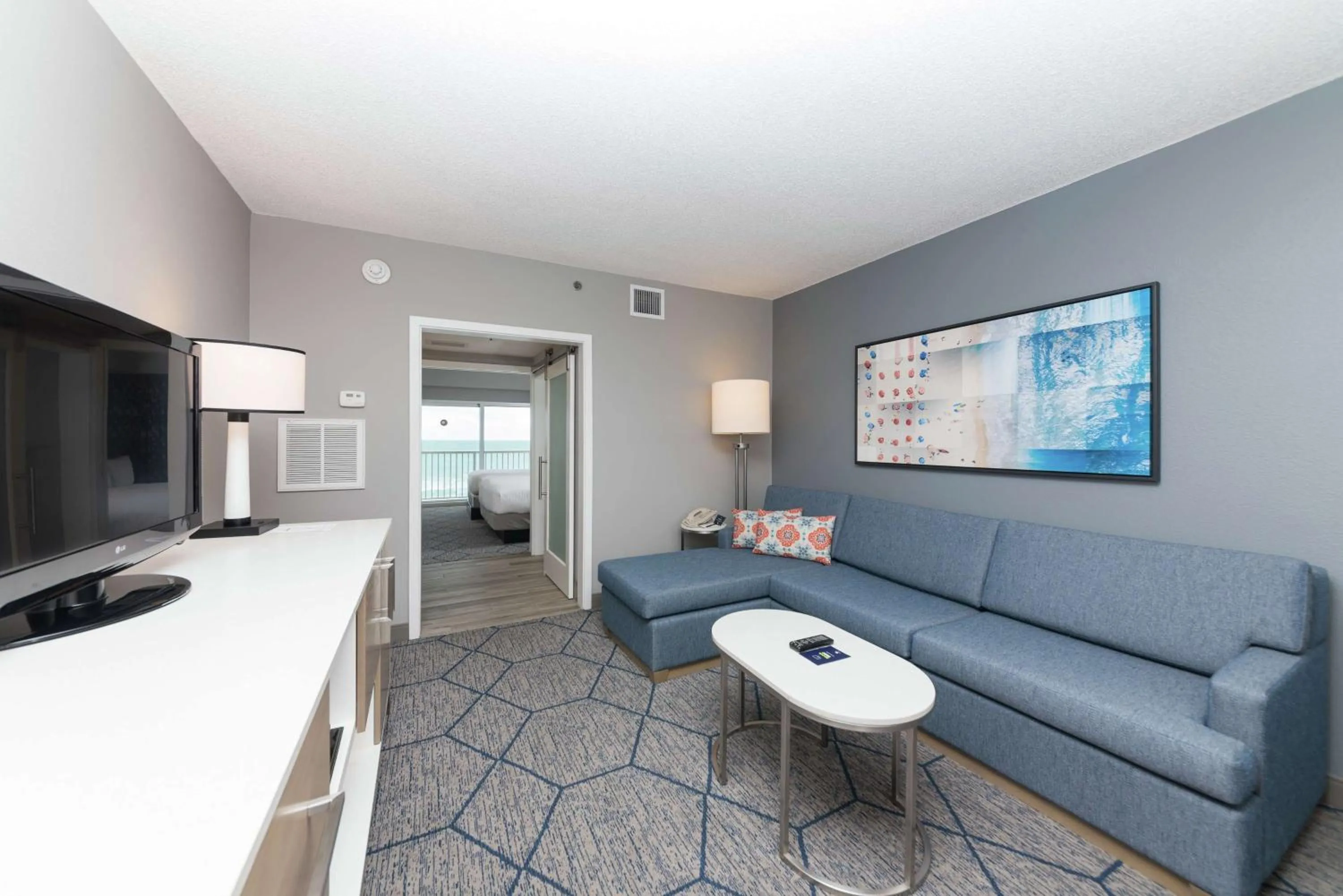 Bed in DoubleTree Suites by Hilton Melbourne Beach Oceanfront