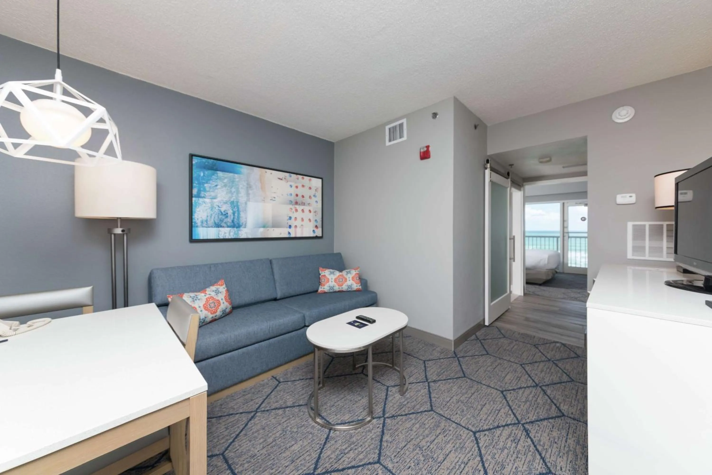 Bed in DoubleTree Suites by Hilton Melbourne Beach Oceanfront