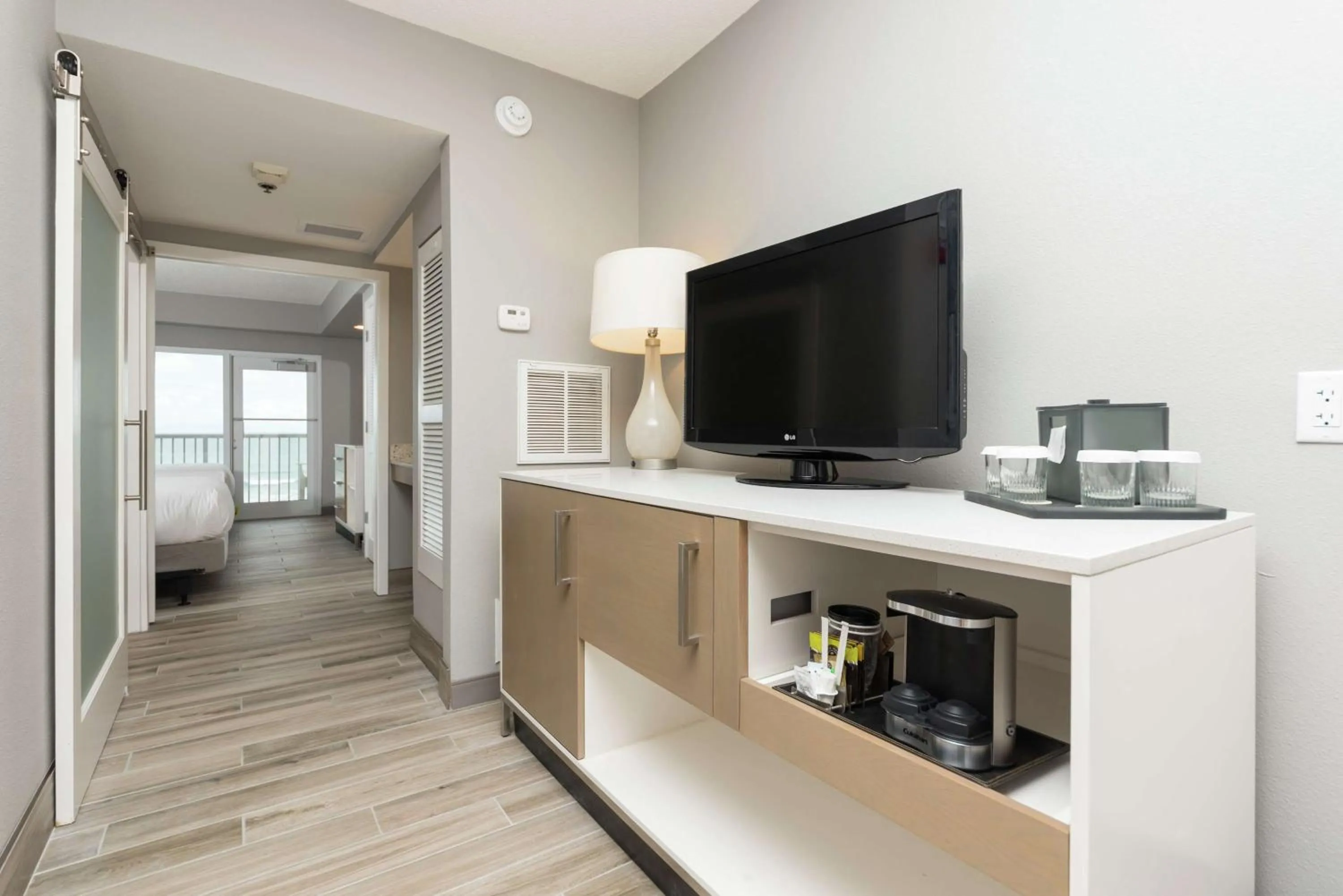 Bed in DoubleTree Suites by Hilton Melbourne Beach Oceanfront