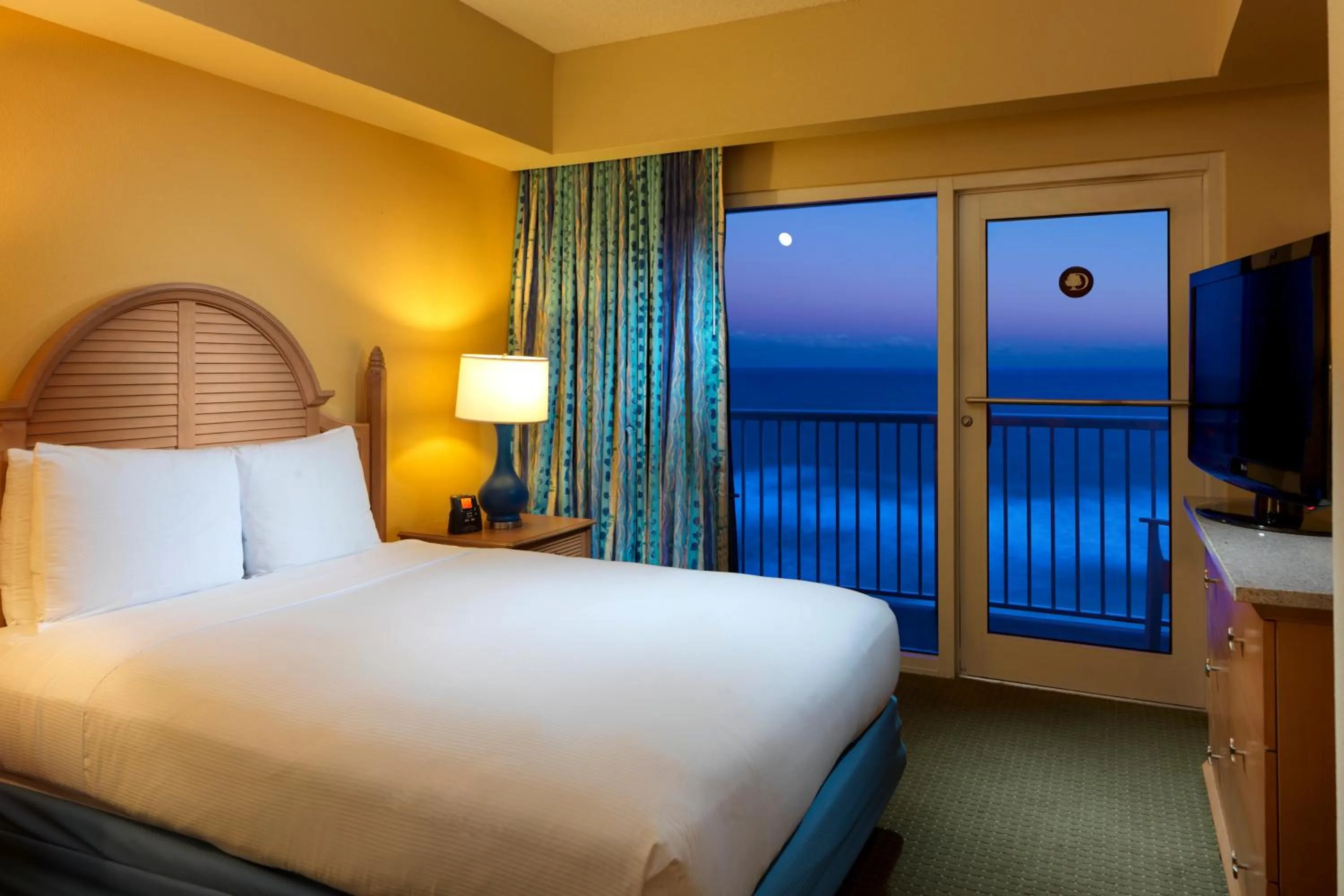 Bed in DoubleTree Suites by Hilton Melbourne Beach Oceanfront