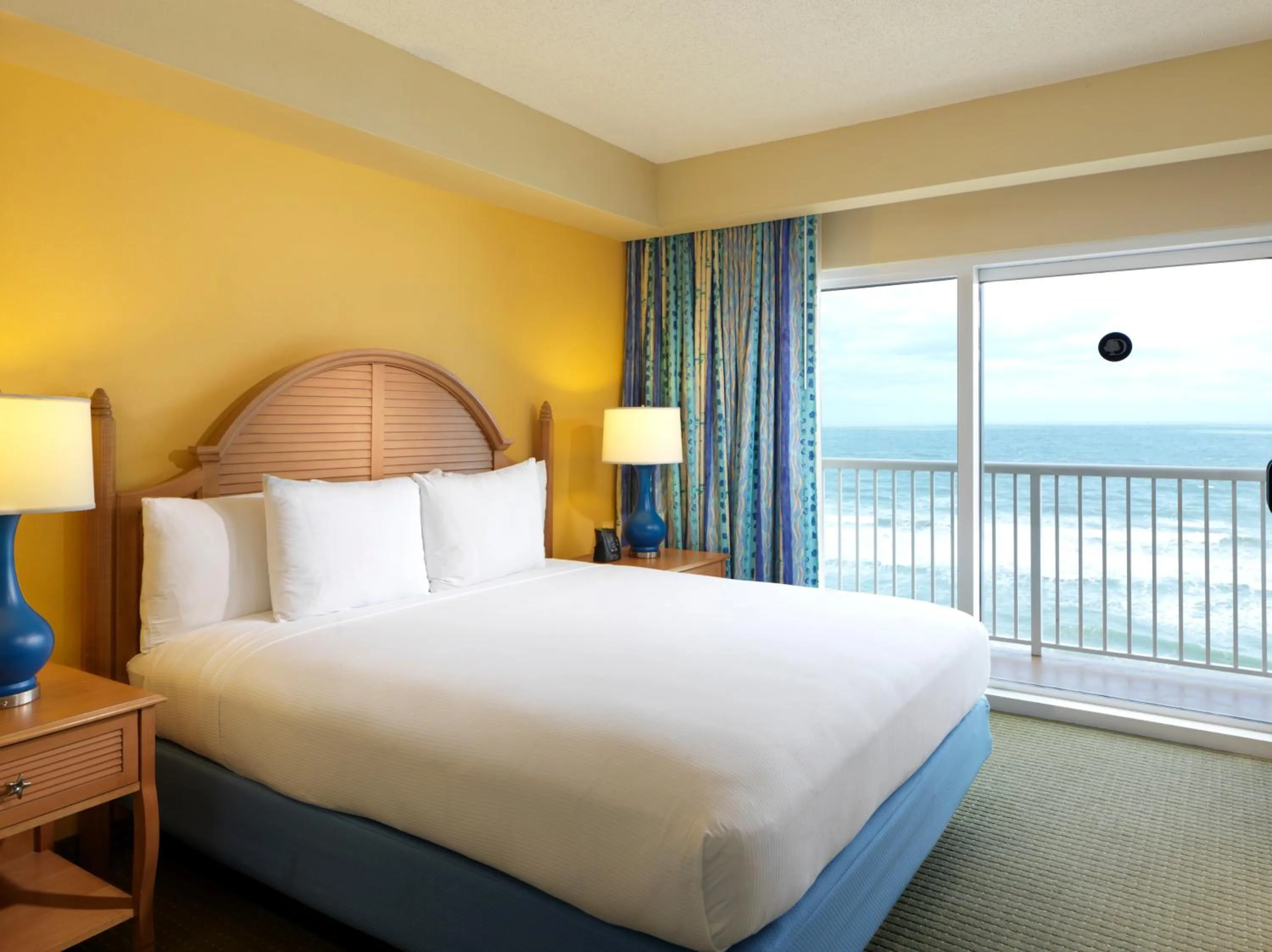 Bed in DoubleTree Suites by Hilton Melbourne Beach Oceanfront