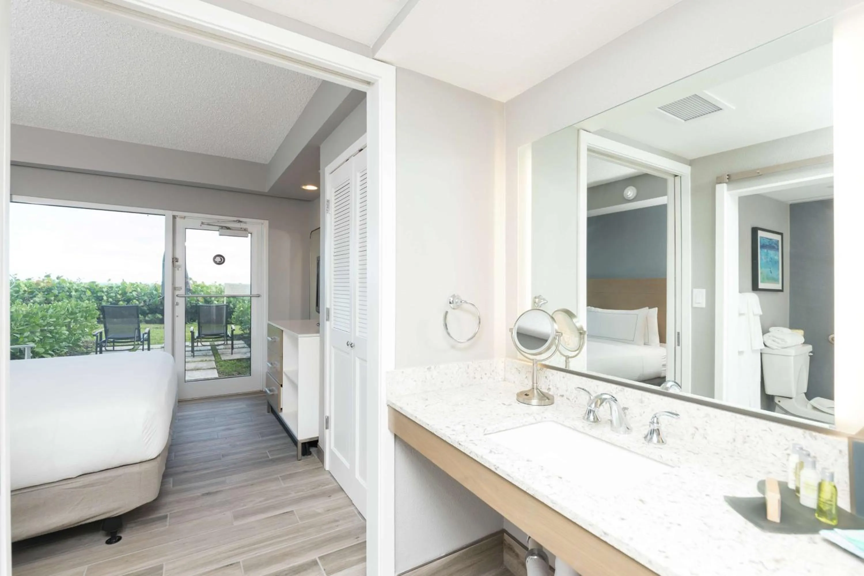 Bed in DoubleTree Suites by Hilton Melbourne Beach Oceanfront