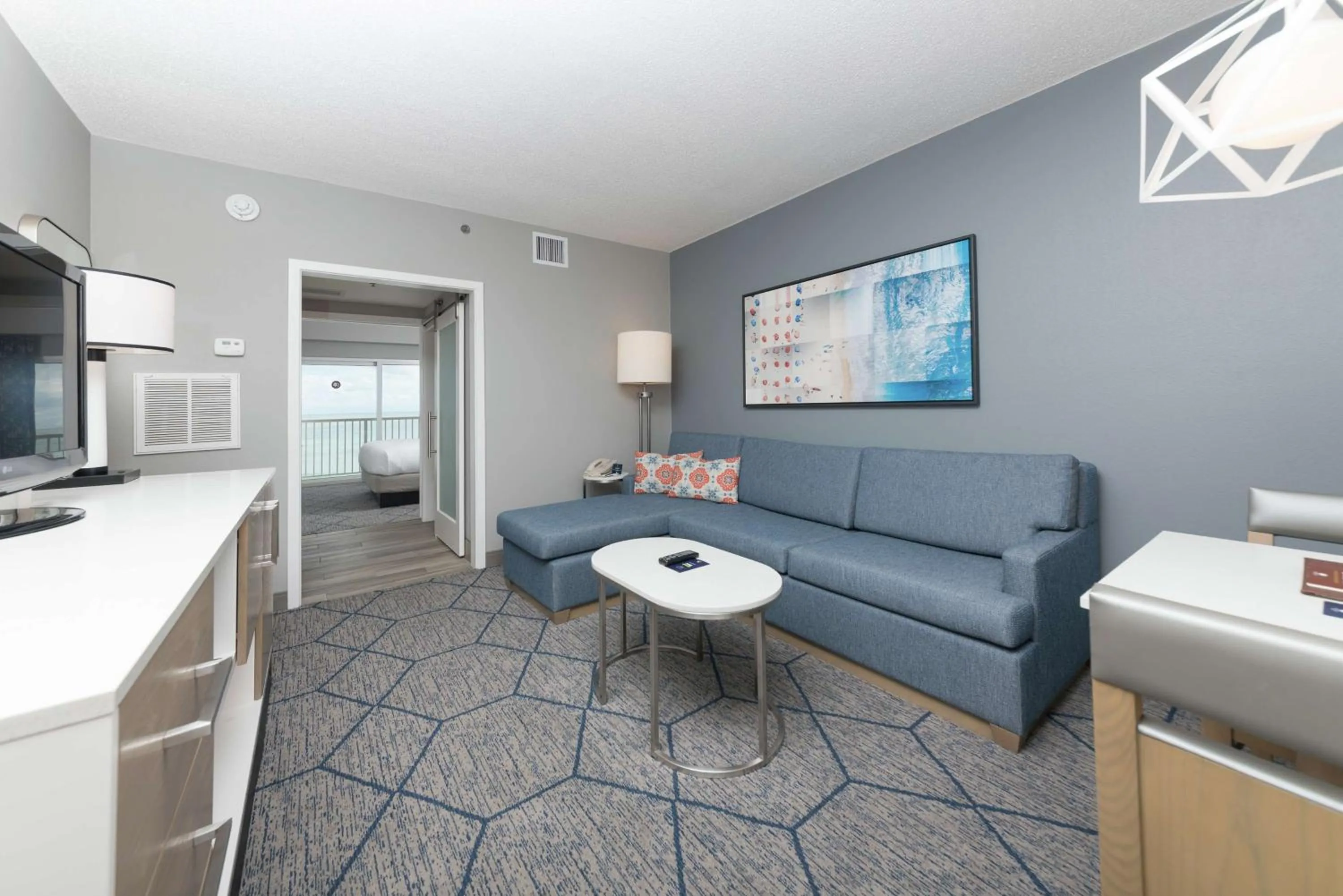 Bed in DoubleTree Suites by Hilton Melbourne Beach Oceanfront