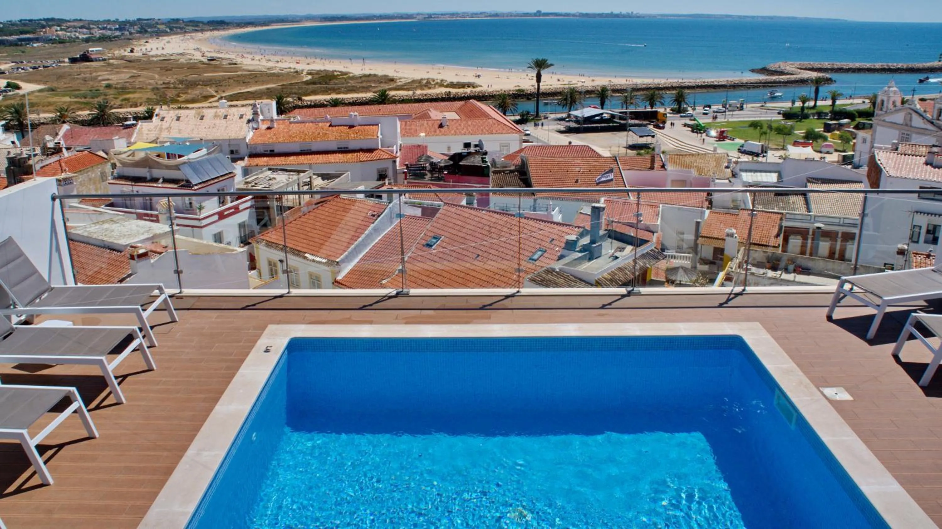 Swimming pool in Topcity Hostel & Suites