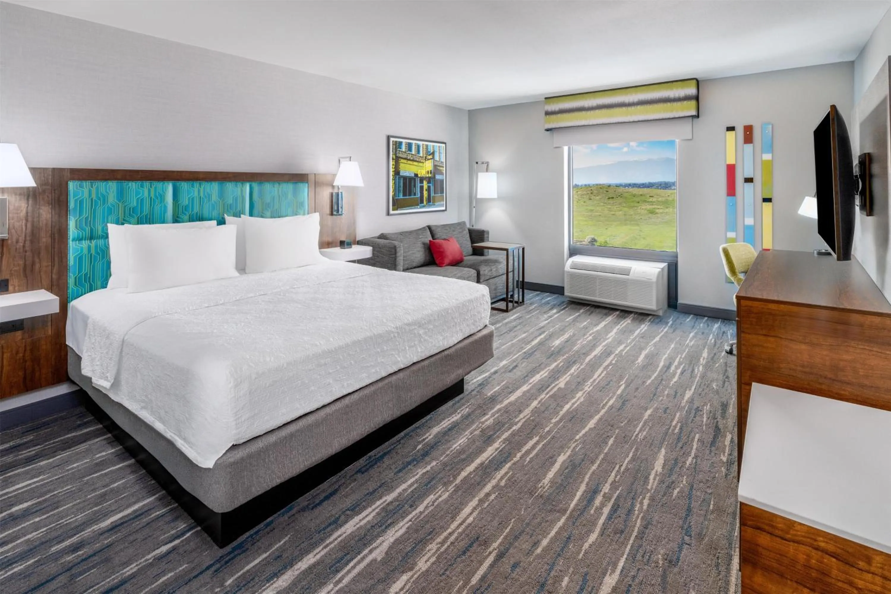 Living room, Bed in Hampton Inn Sheridan