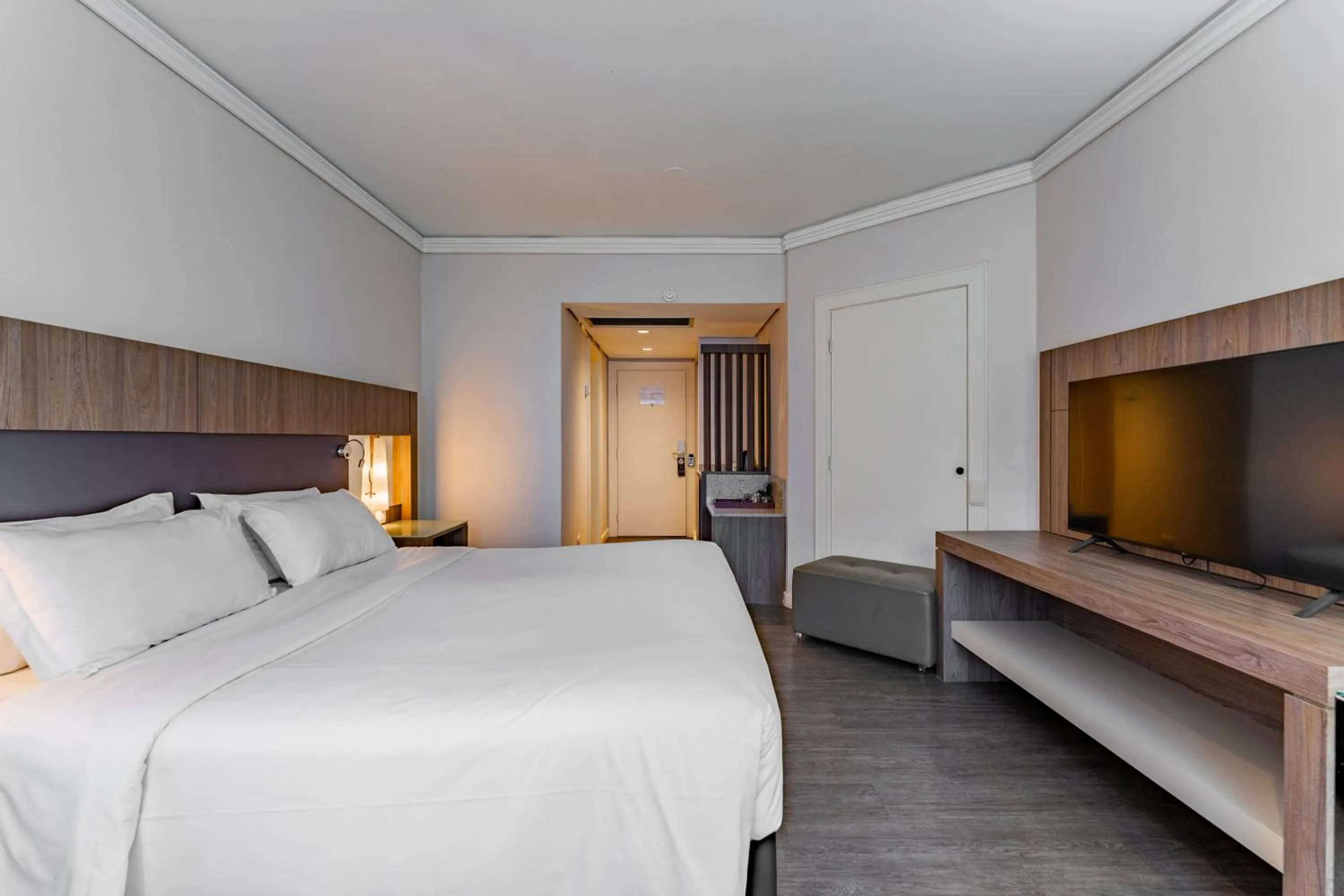 Bed in Grand Mercure Curitiba Rayon