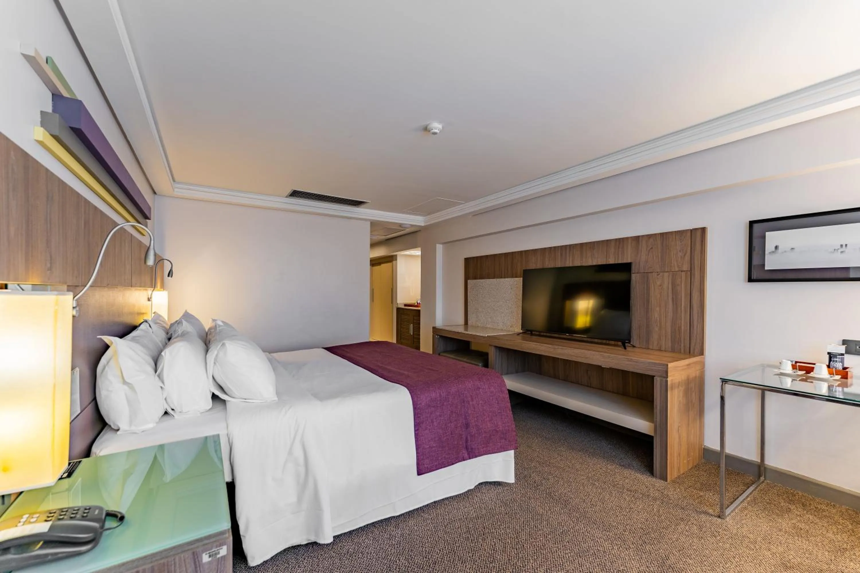 Bed in Grand Mercure Curitiba Rayon