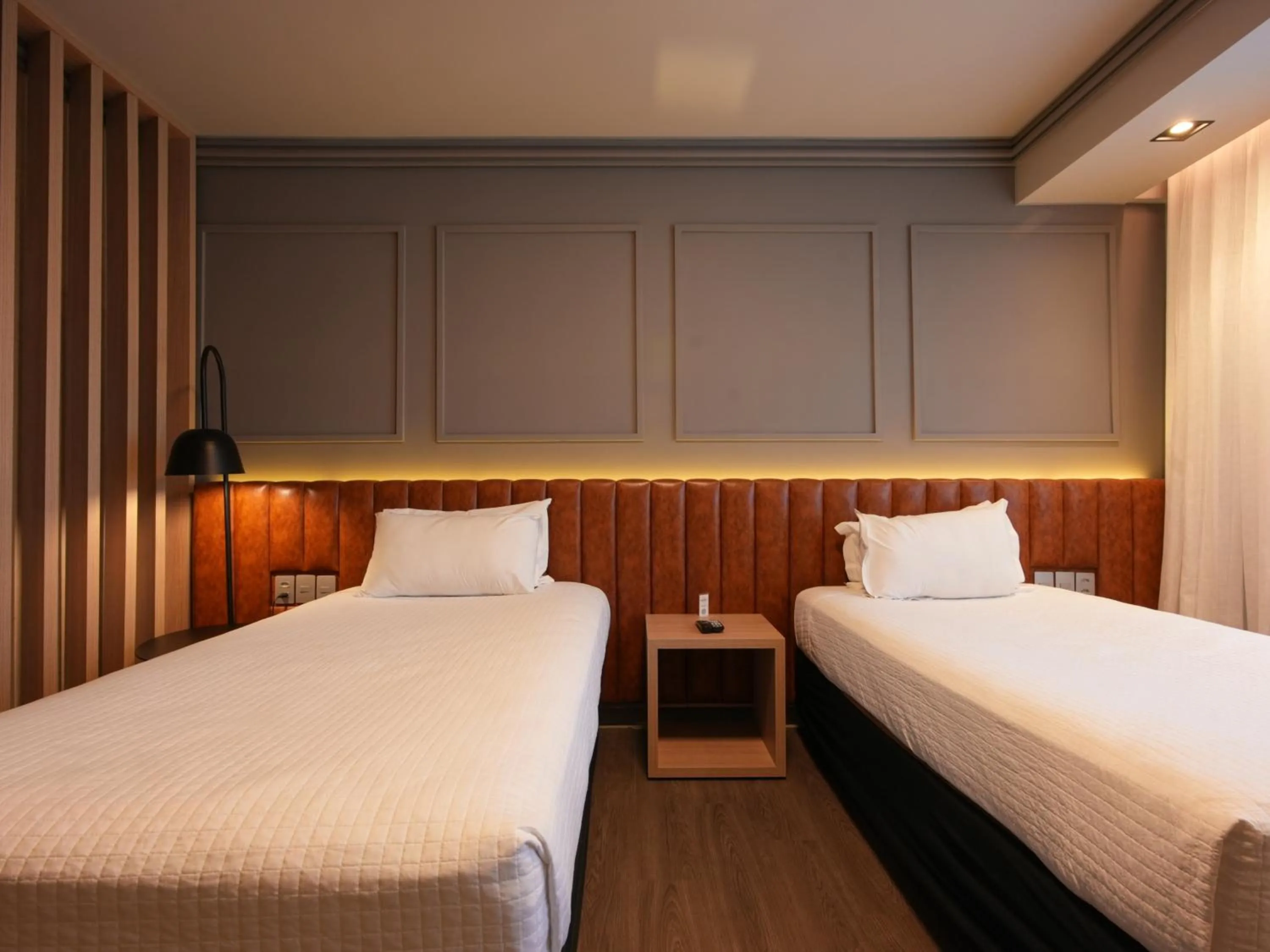 Bed in Grand Mercure Curitiba Rayon