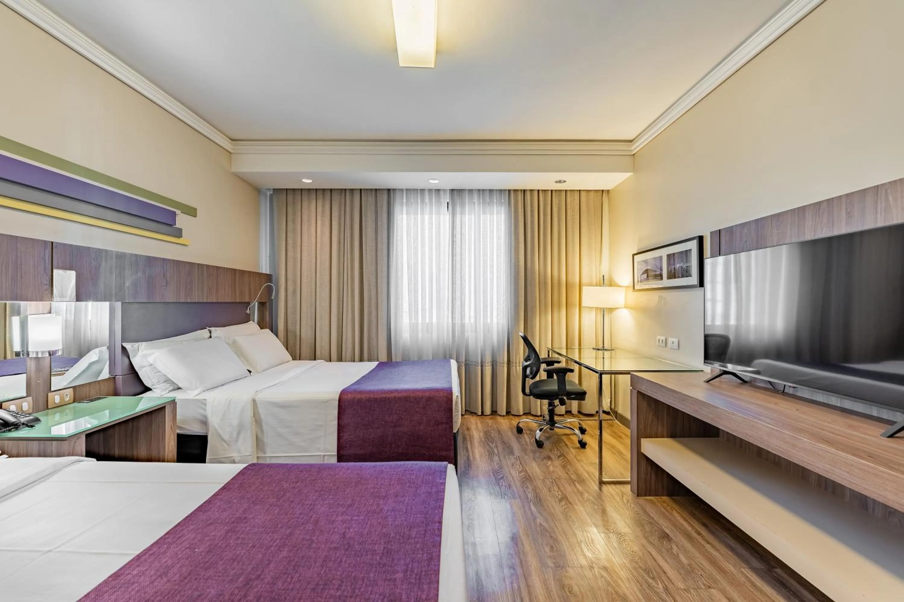 Bed in Grand Mercure Curitiba Rayon