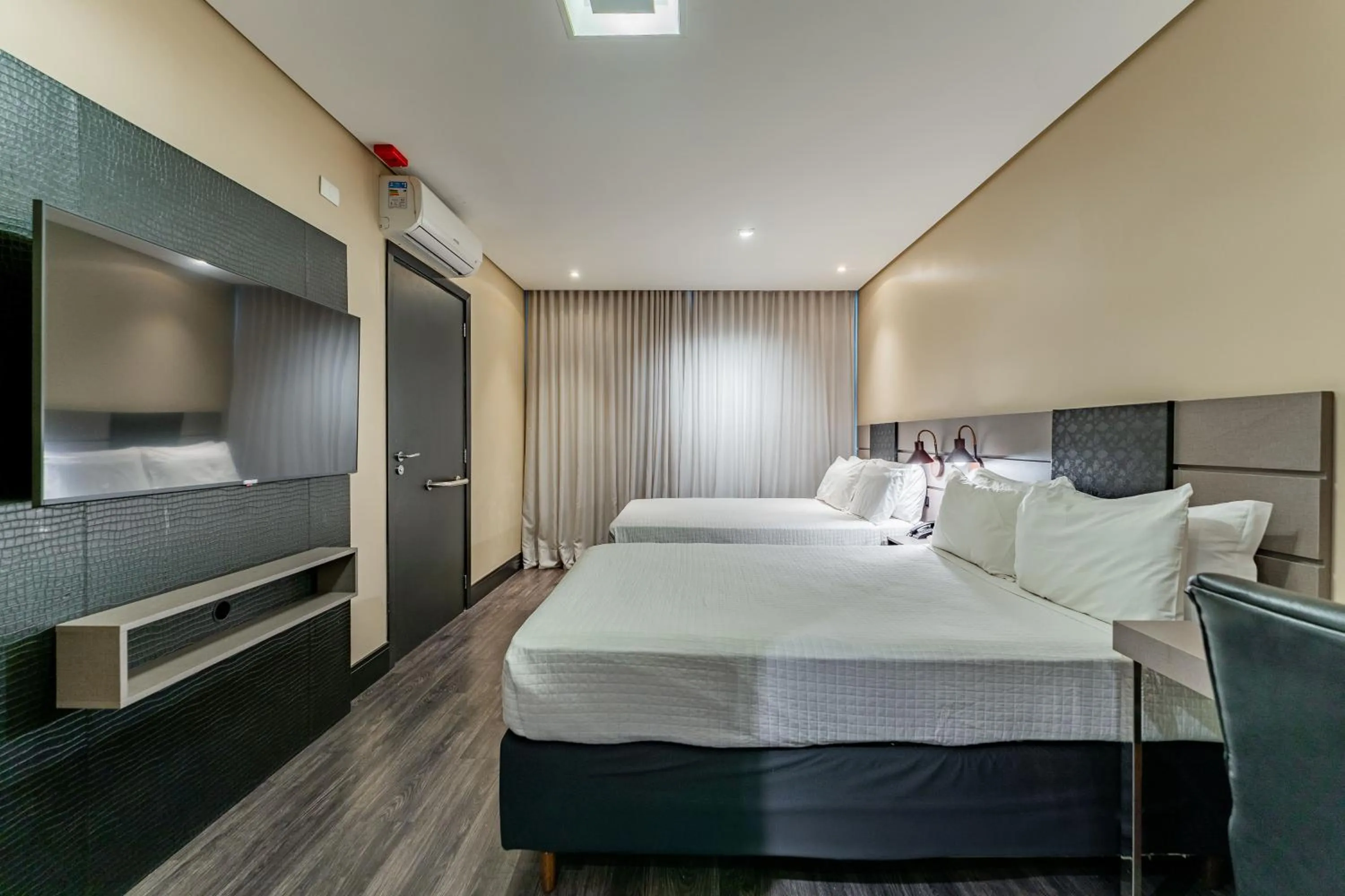 Bed in Grand Mercure Curitiba Rayon