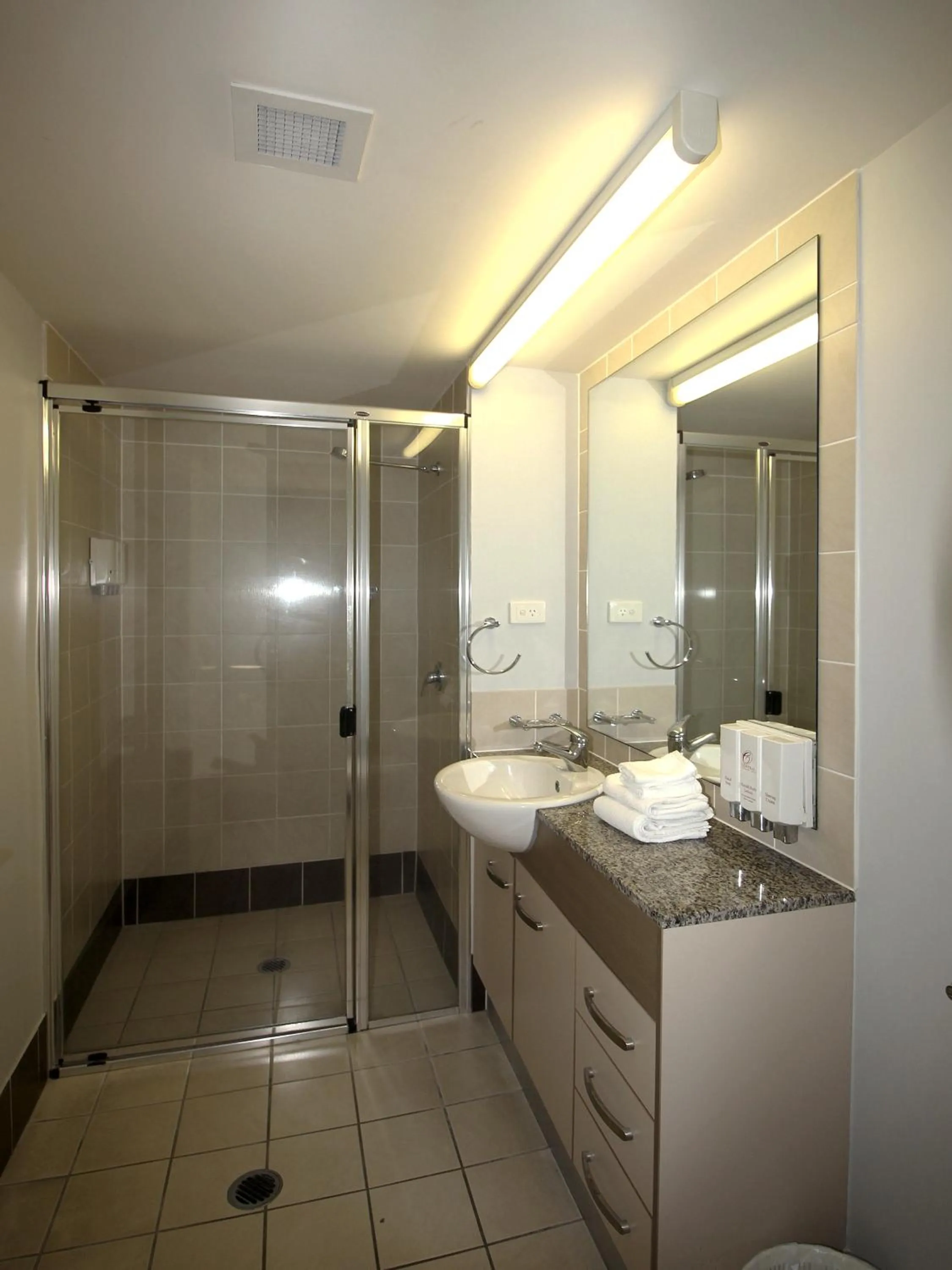 Bathroom in Caloundra Central Apartment Hotel Official