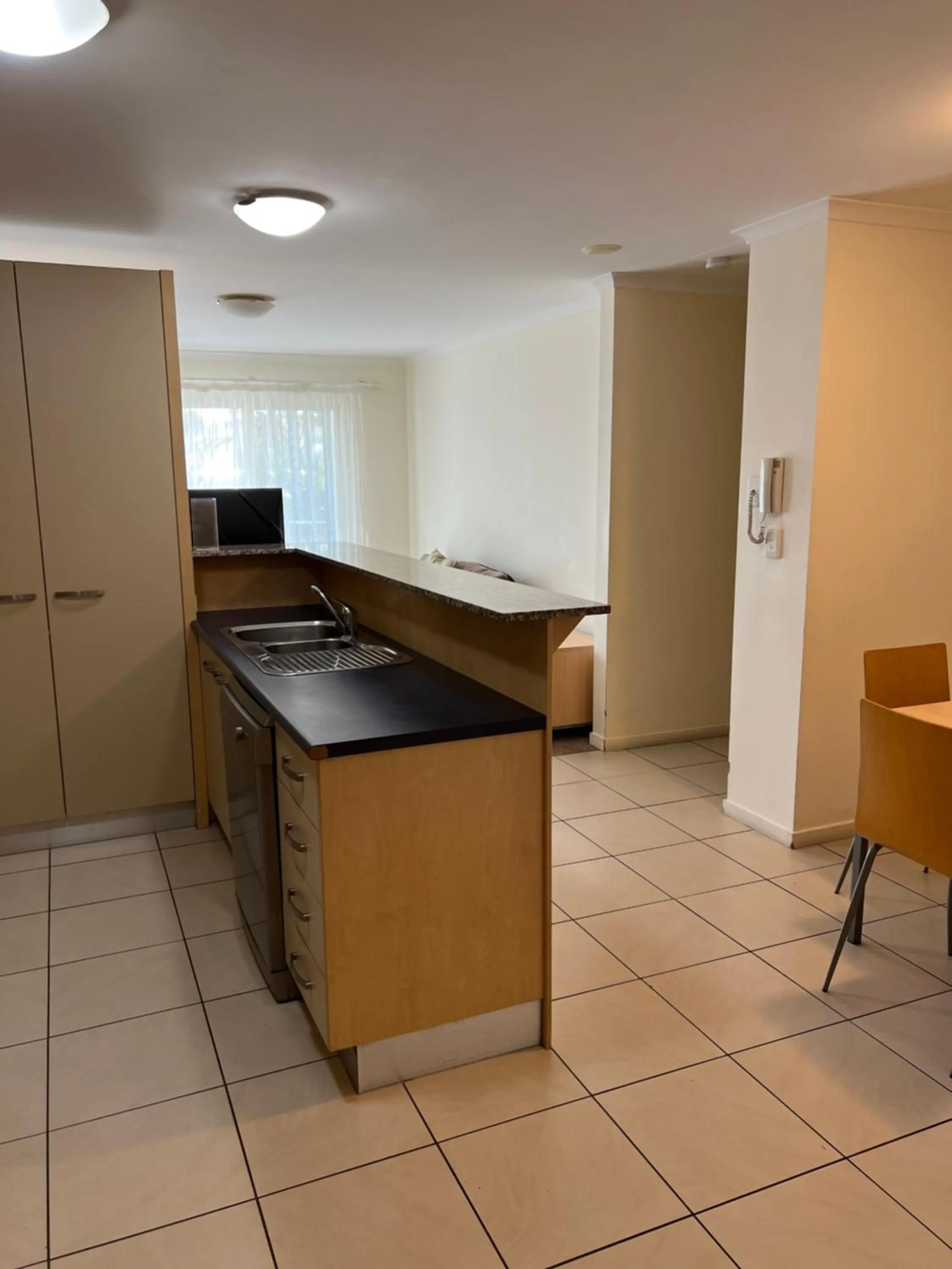 Kitchen or kitchenette in Caloundra Central Apartment Hotel Official