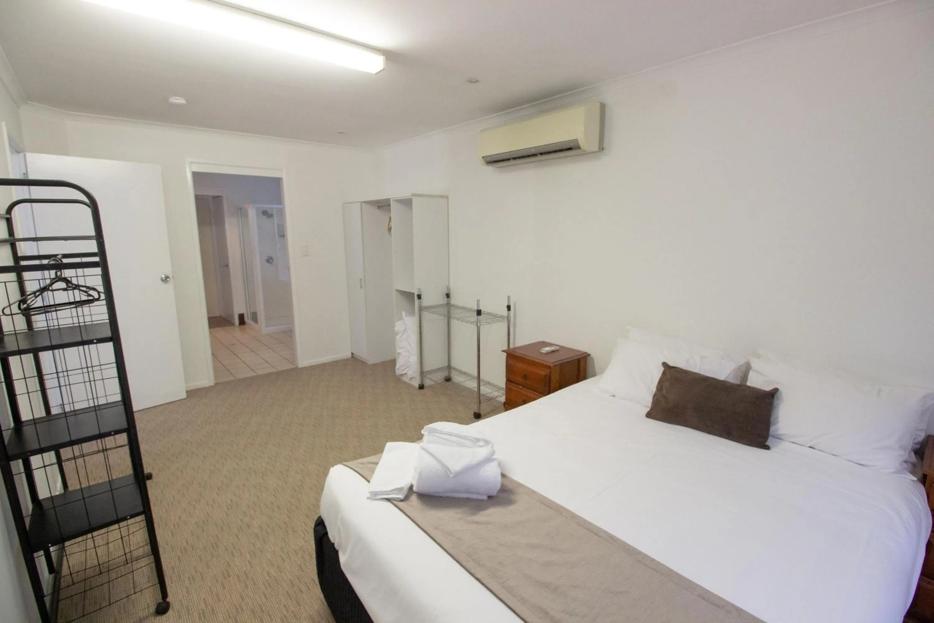 Bed in Caloundra Central Apartment Hotel Official