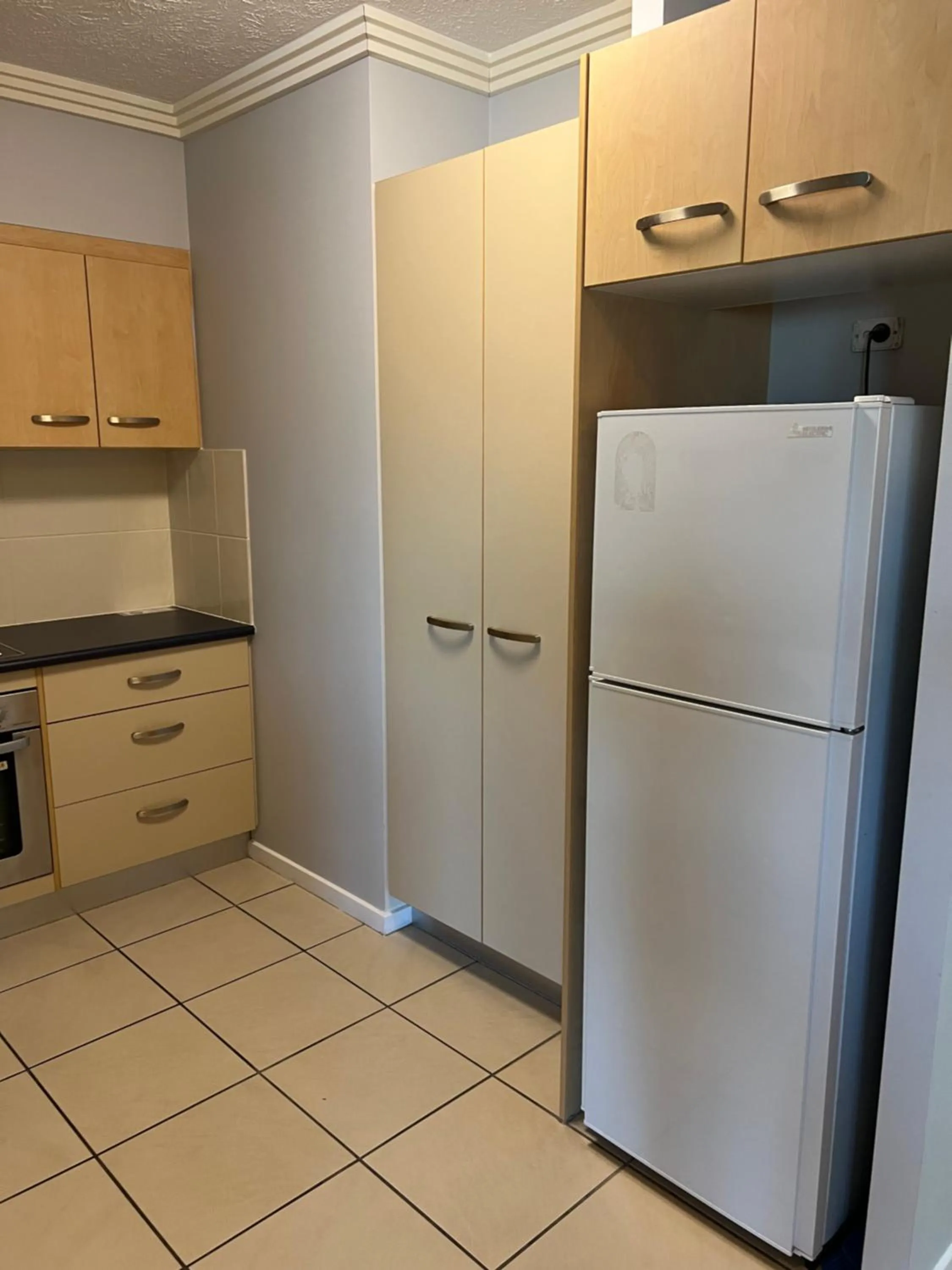 Kitchen or kitchenette in Caloundra Central Apartment Hotel Official