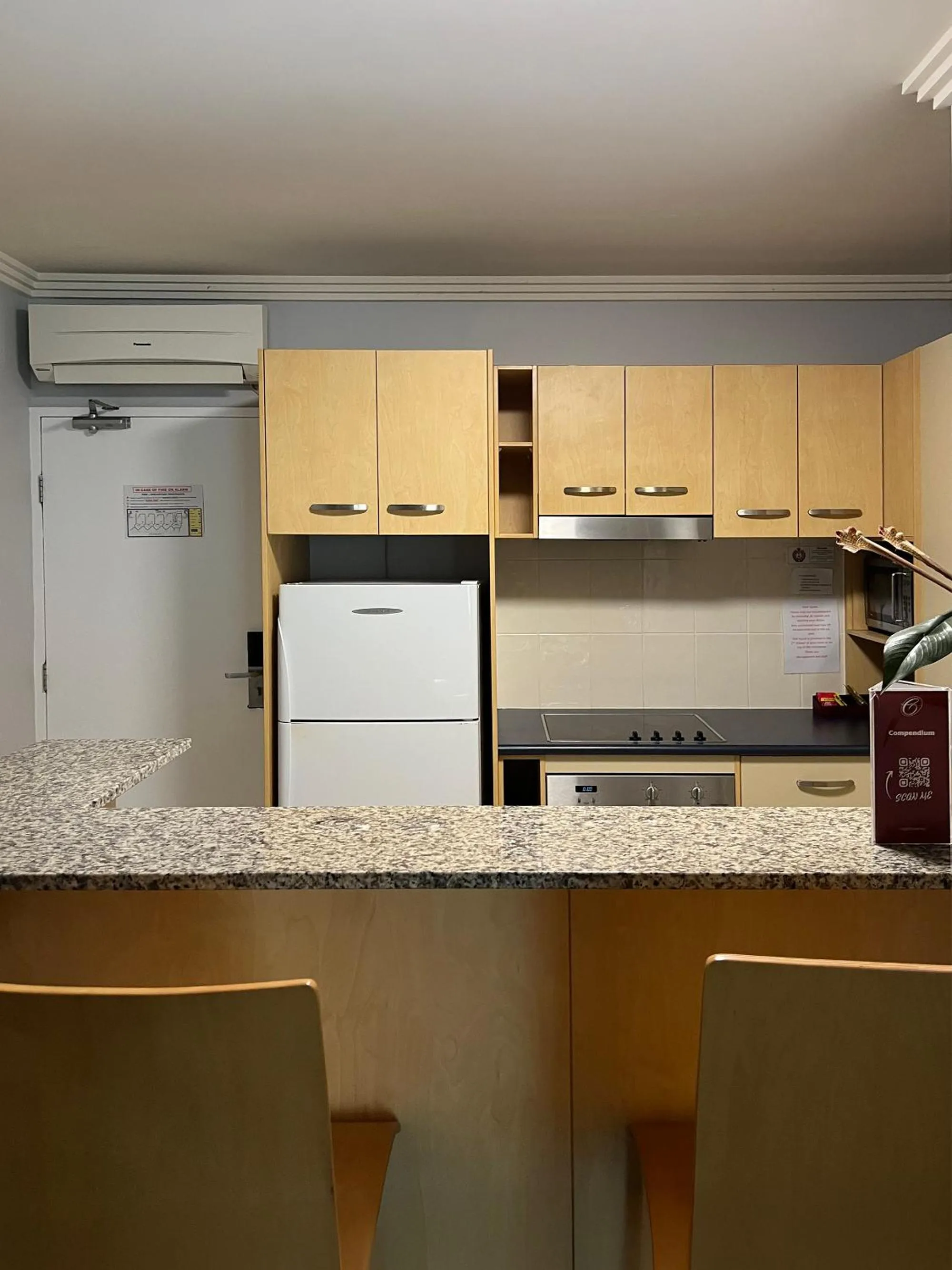 Kitchen or kitchenette in Caloundra Central Apartment Hotel Official