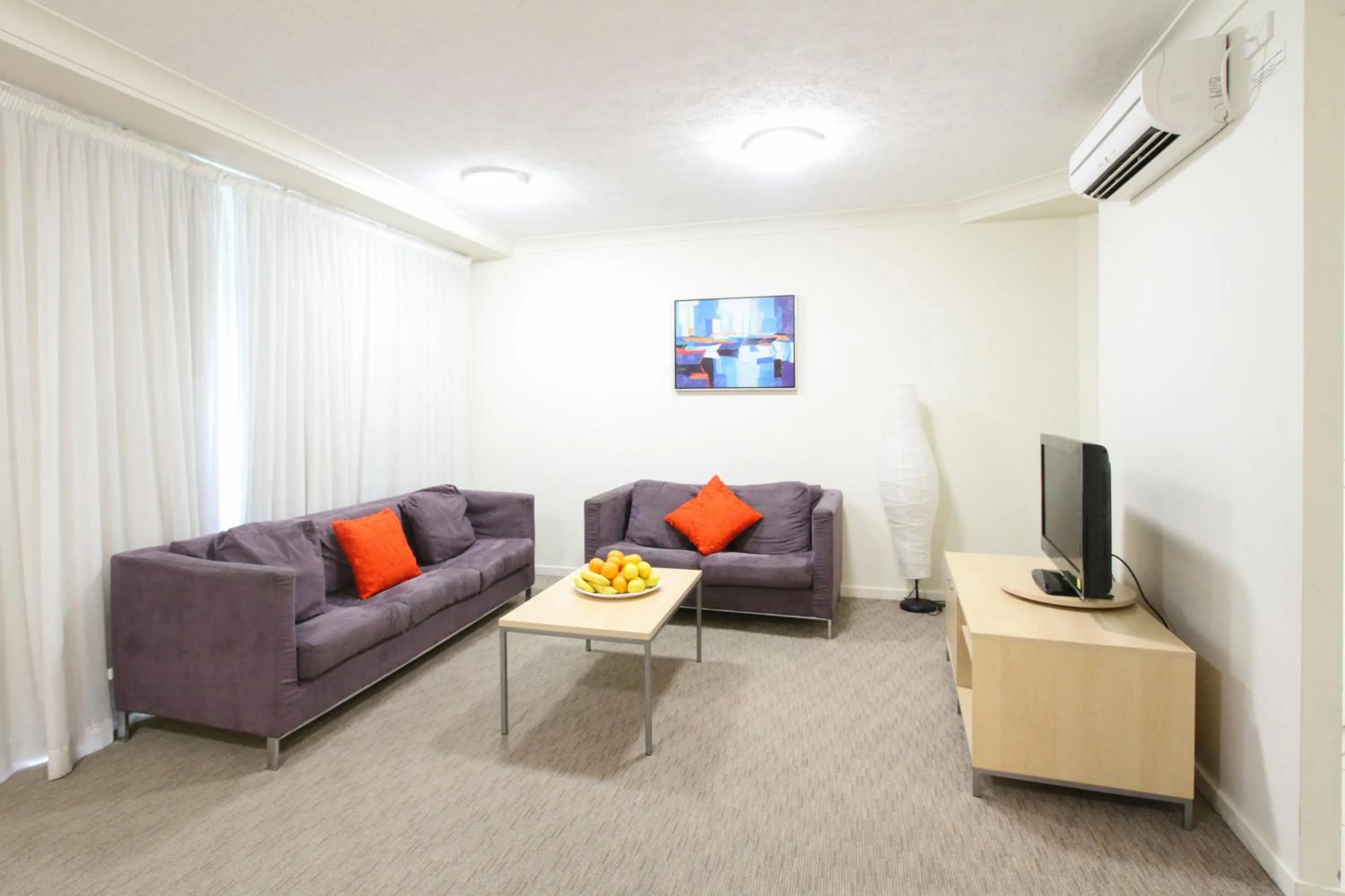 Living room in Caloundra Central Apartment Hotel Official