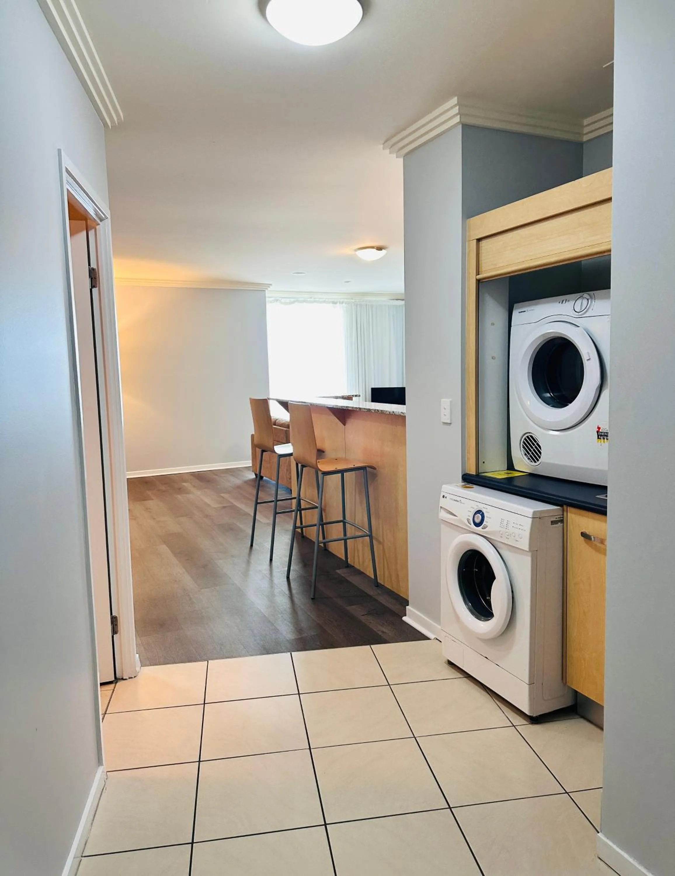 washing machine in Caloundra Central Apartment Hotel Official