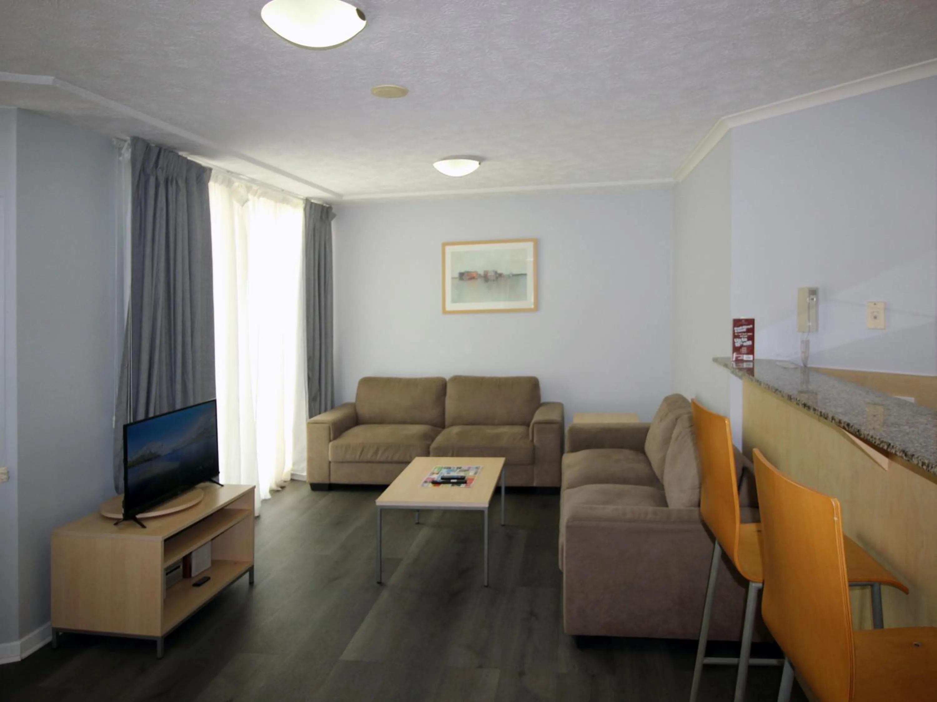 Living room in Caloundra Central Apartment Hotel Official