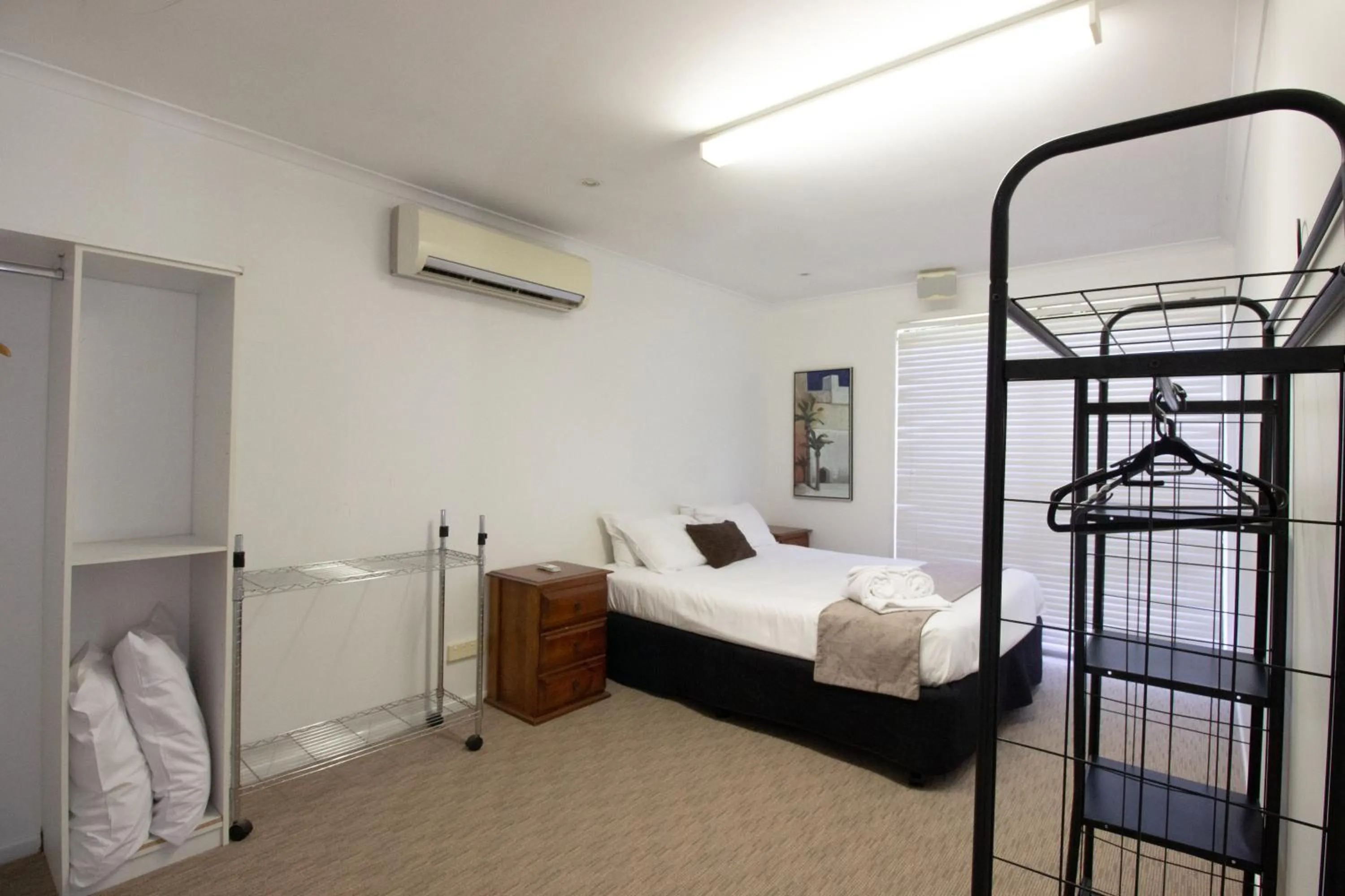 Bed in Caloundra Central Apartment Hotel Official