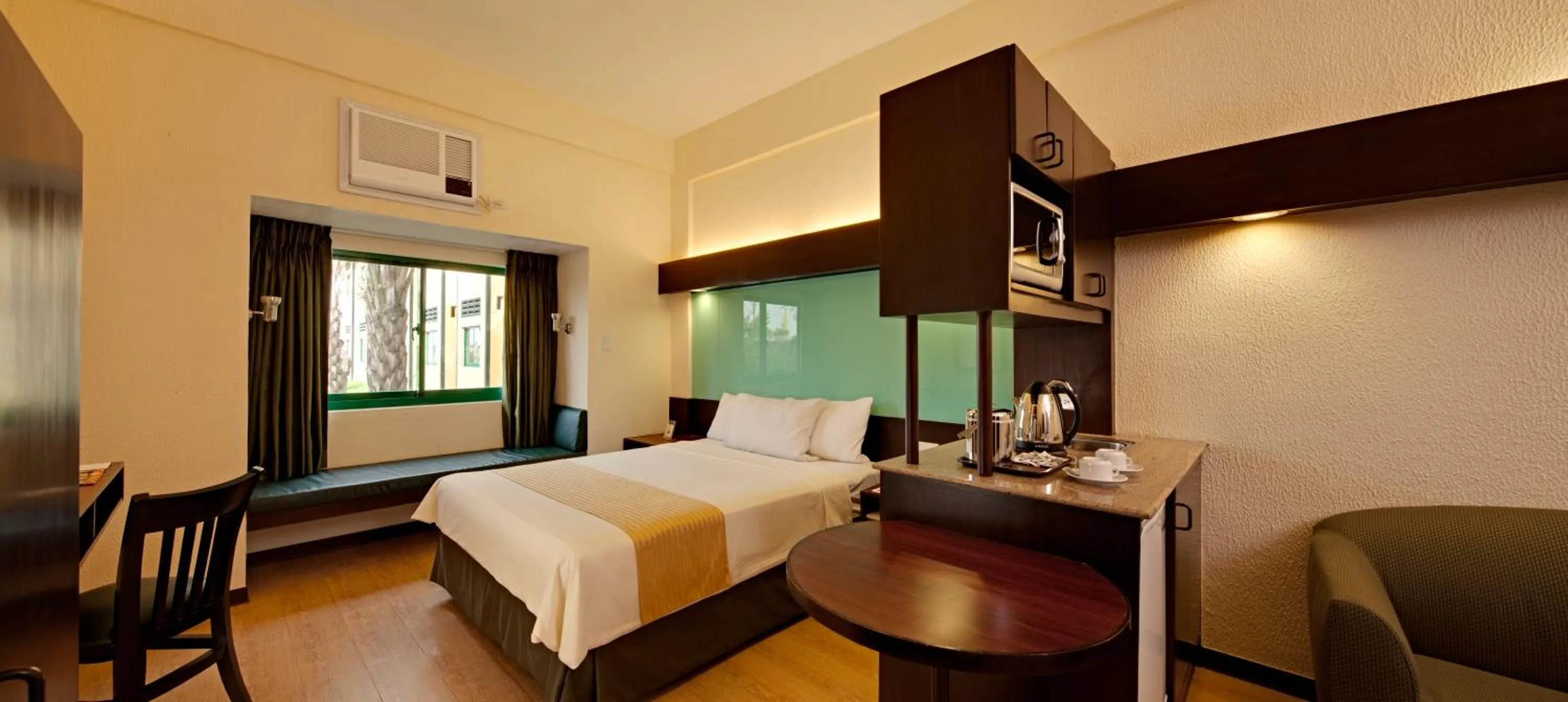 Bathroom, Bed in Microtel by Wyndham Cabanatuan