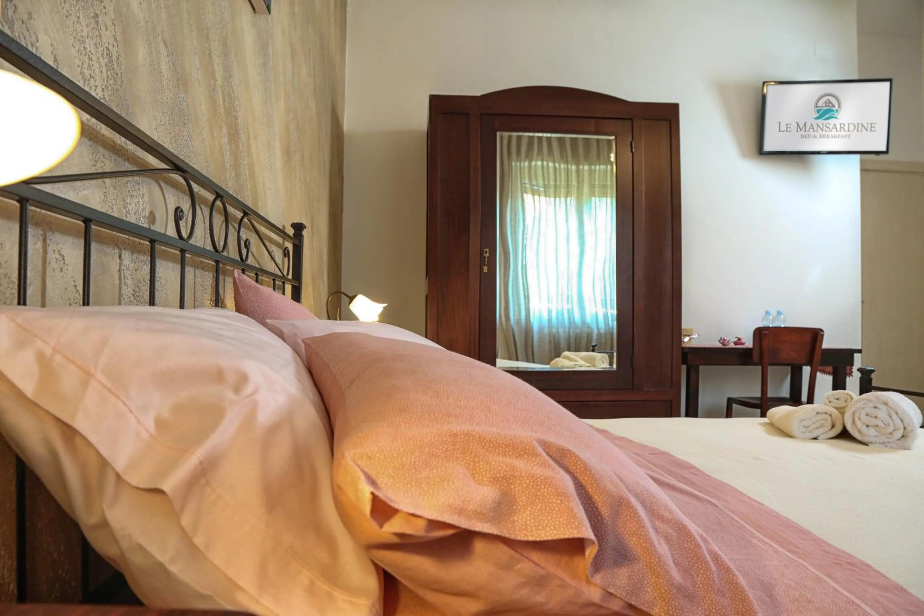 Bed in Le mansardine