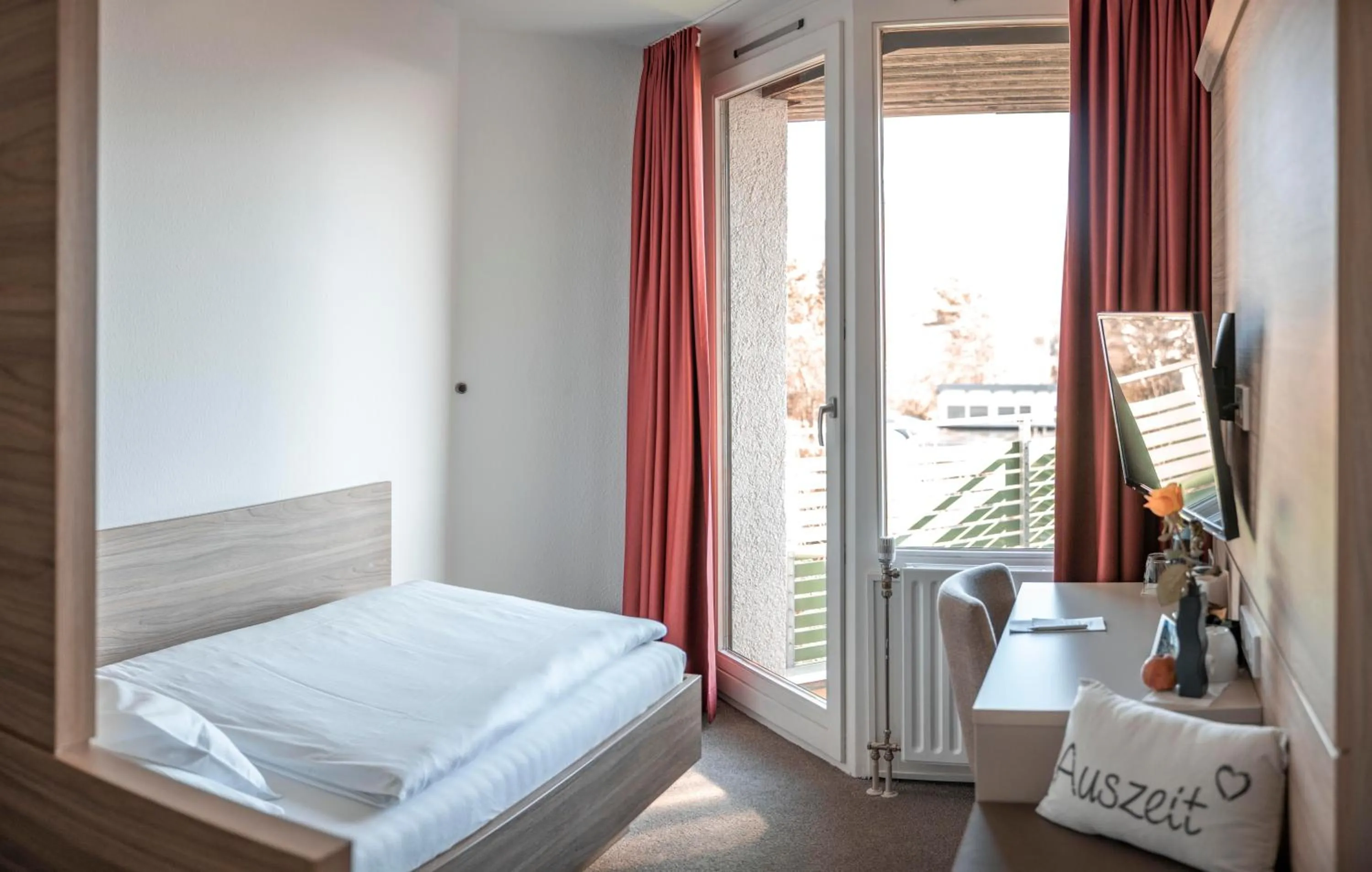 Photo of the whole room, Bed in Hotel am Schlossberg