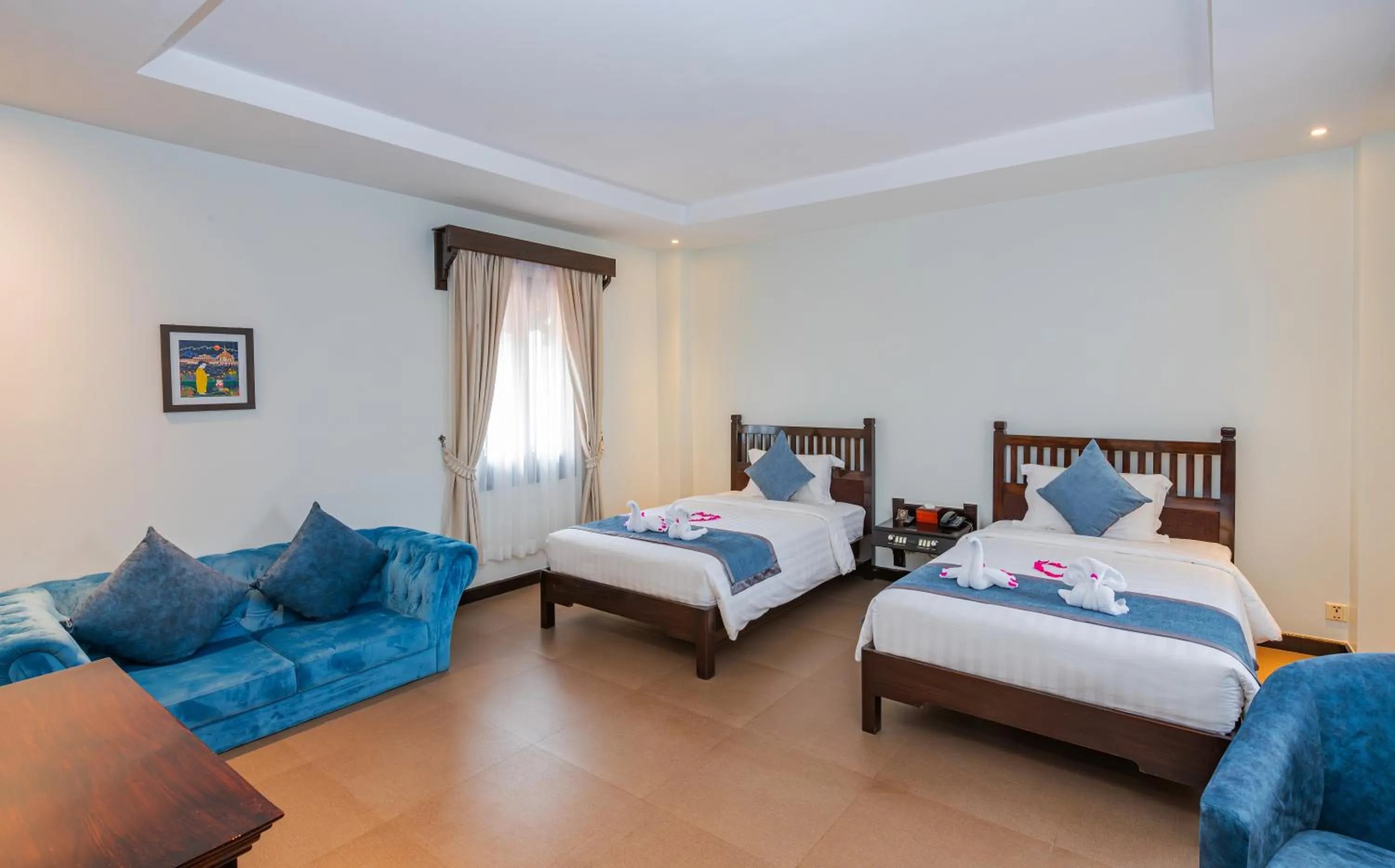 Photo of the whole room, Bed in Sokchea Angkor Hotel