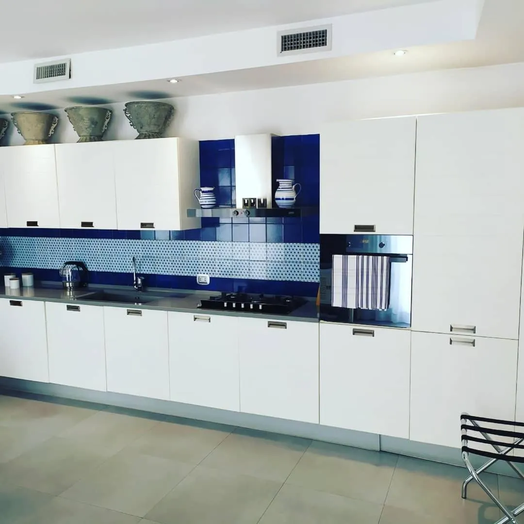 Kitchen or kitchenette in Cubo Apartments