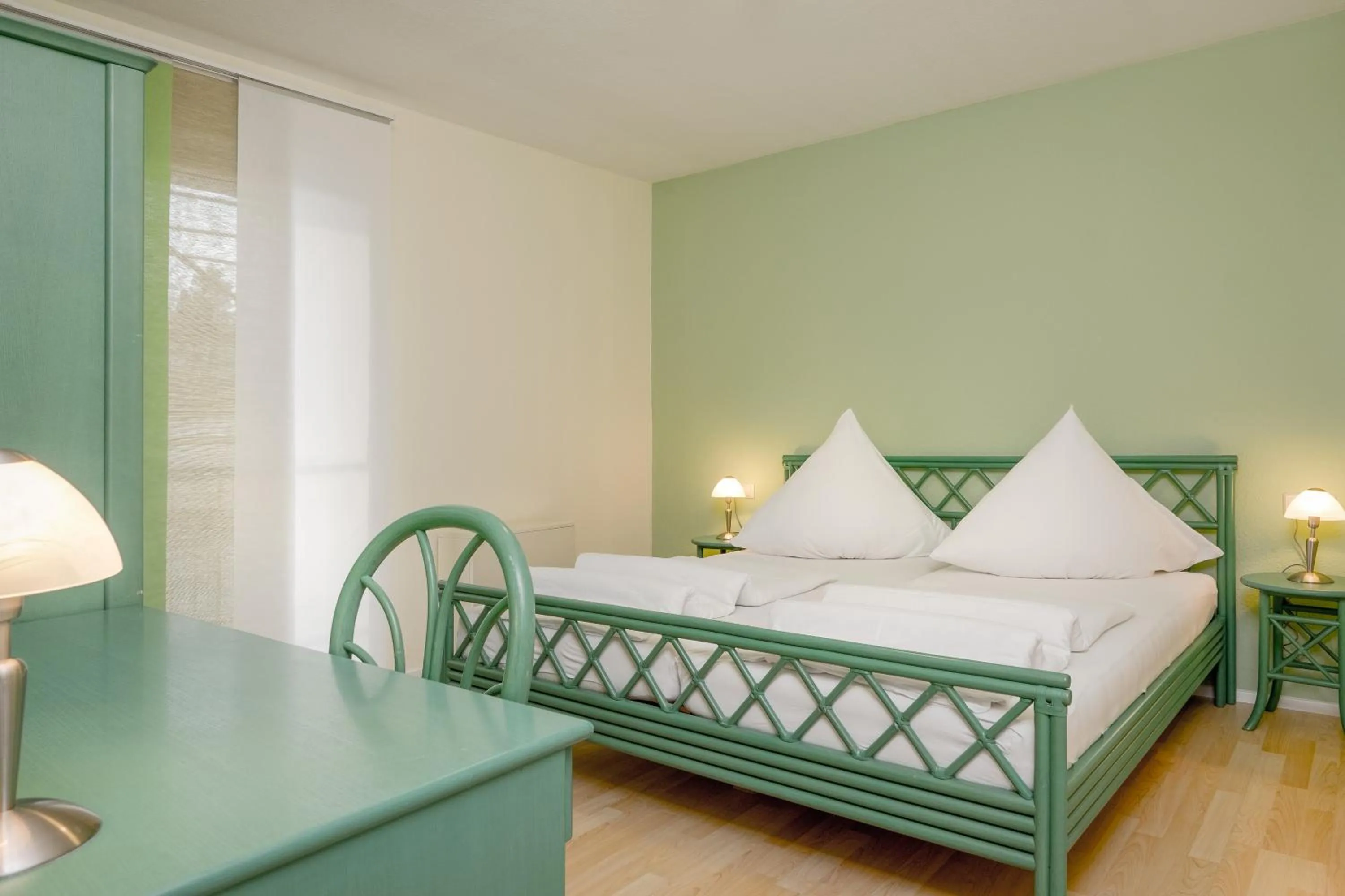 Photo of the whole room, Bed in Gästehaus Mythos