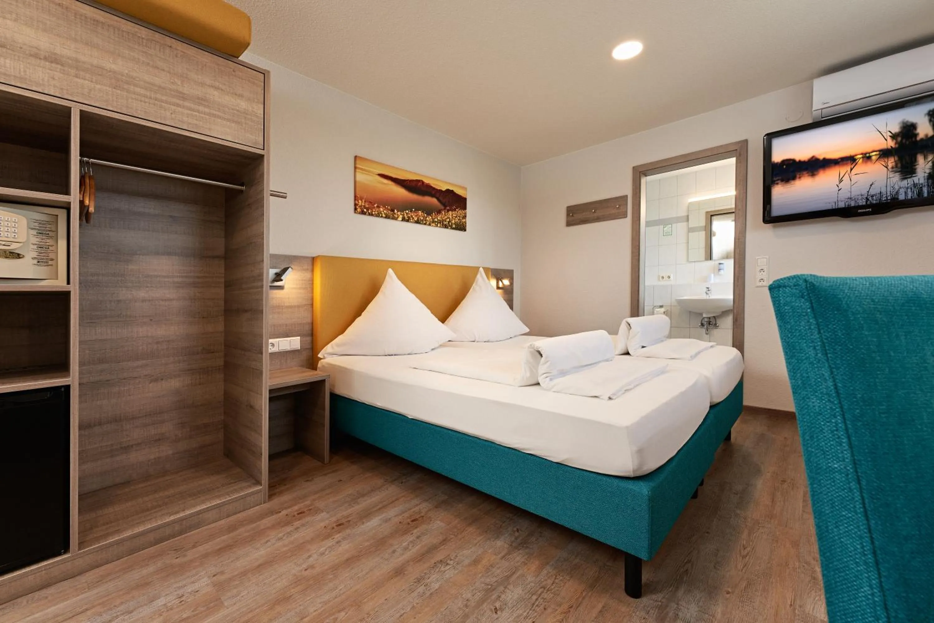 Photo of the whole room, Bed in Gästehaus Mythos