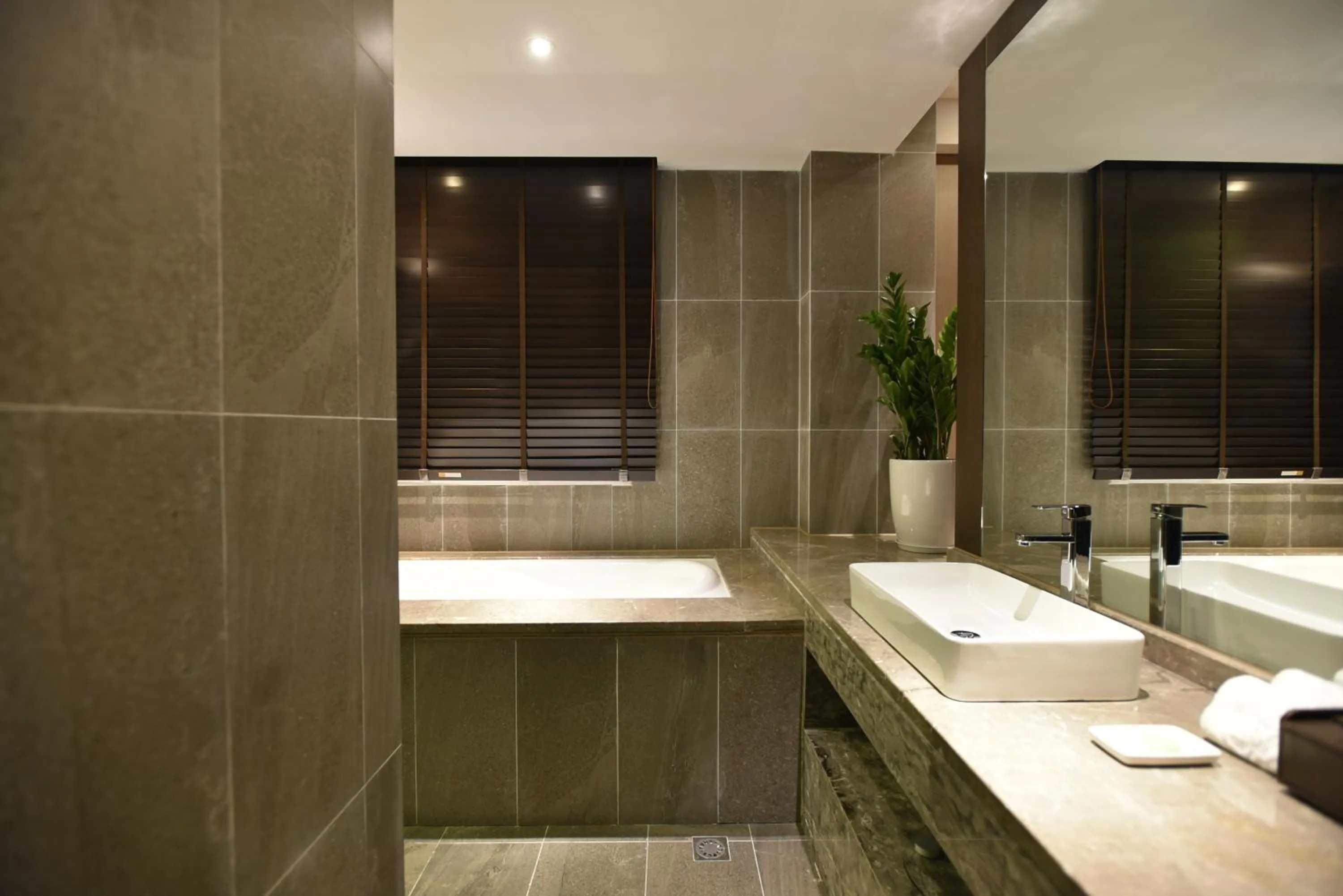 Bathroom in SHANGHAI-DECO Hotel-Free shuttle bus to Pudong Airport and Disneyland