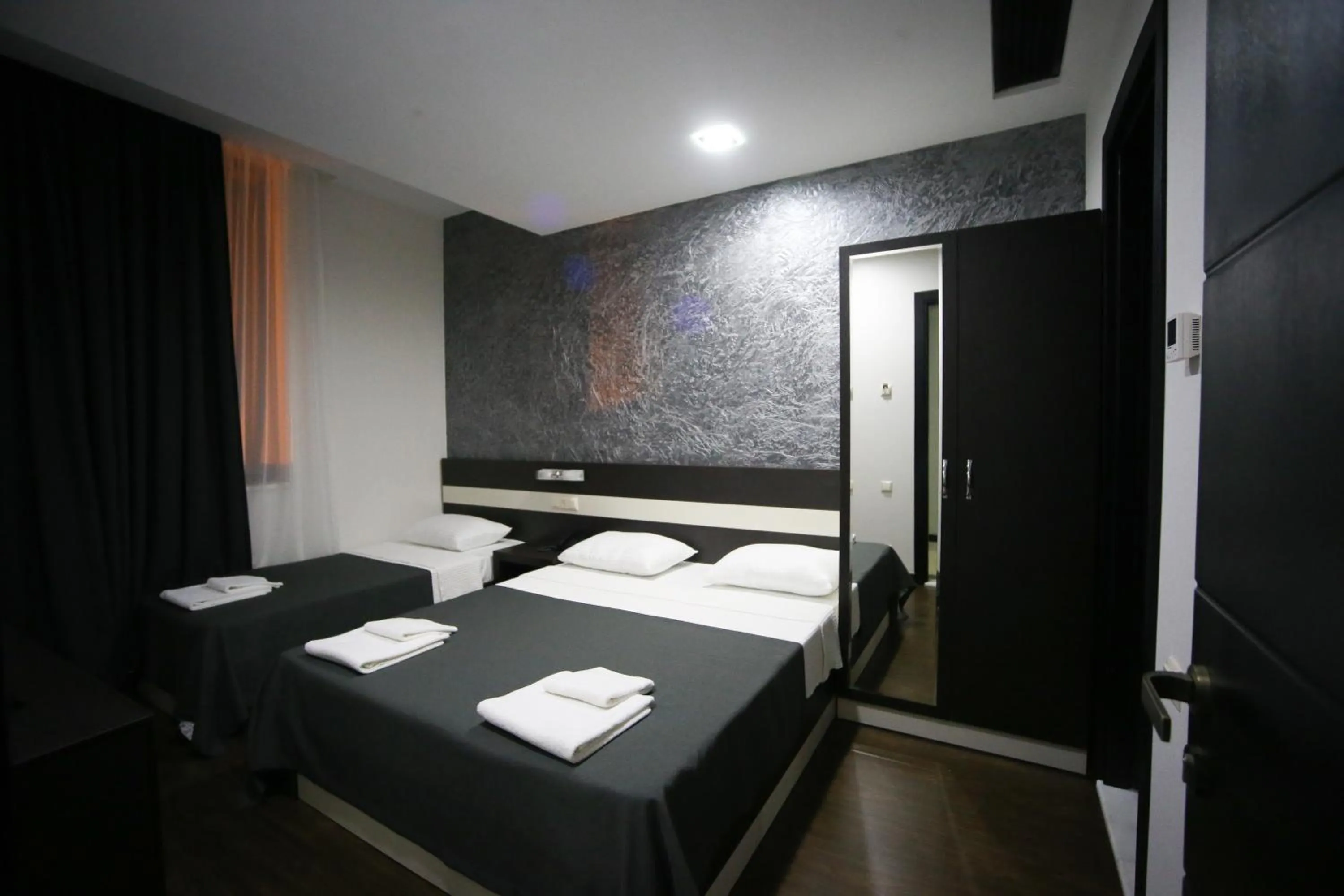 Photo of the whole room, Bed in West Tower Hotel