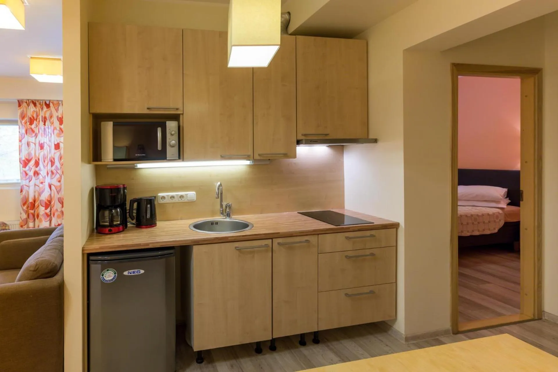 Kitchen or kitchenette, Bed in Viiking Spa Hotel