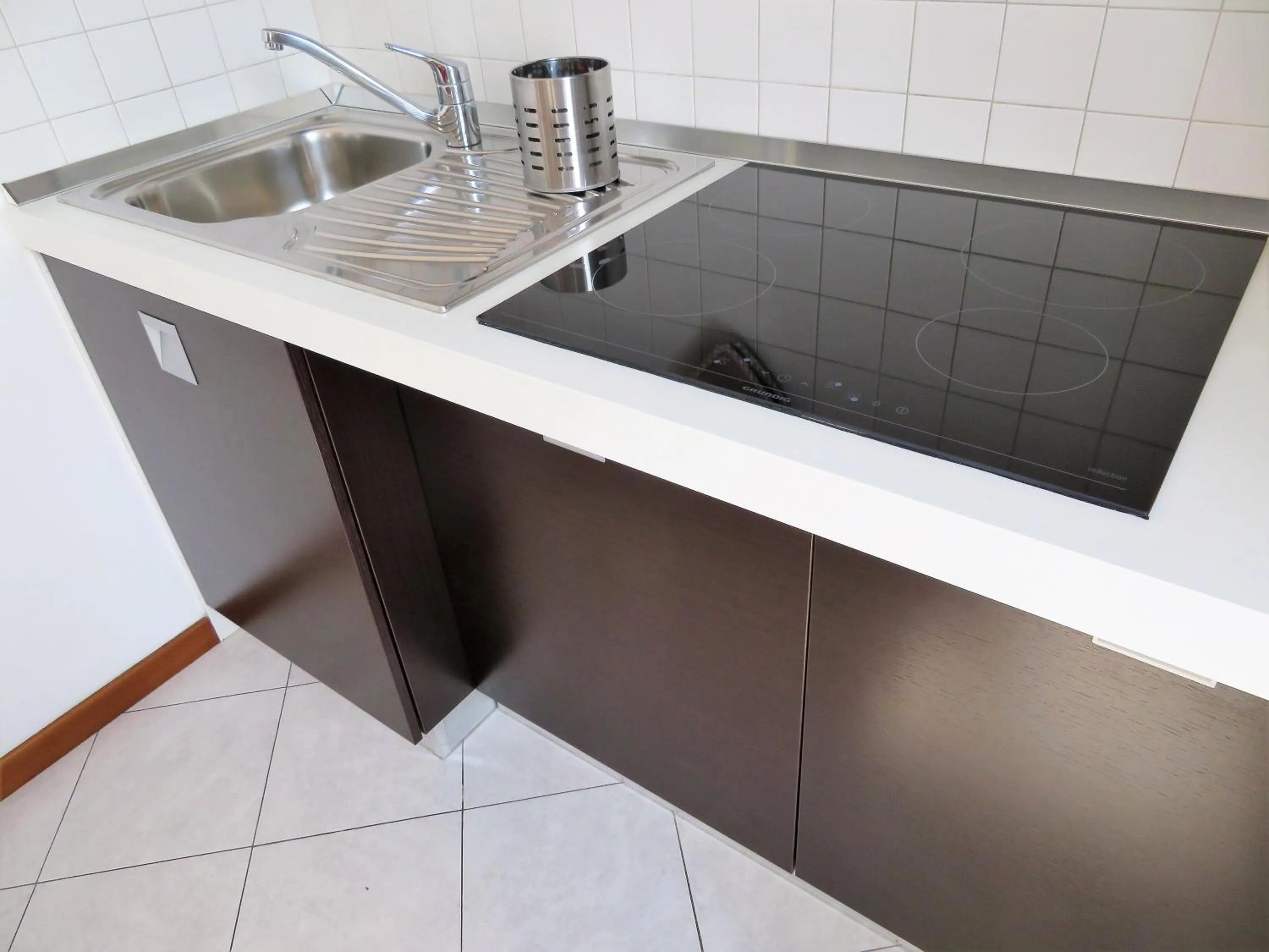 Kitchen or kitchenette in Verona Class ApartHotel "Residenze del Cuore"