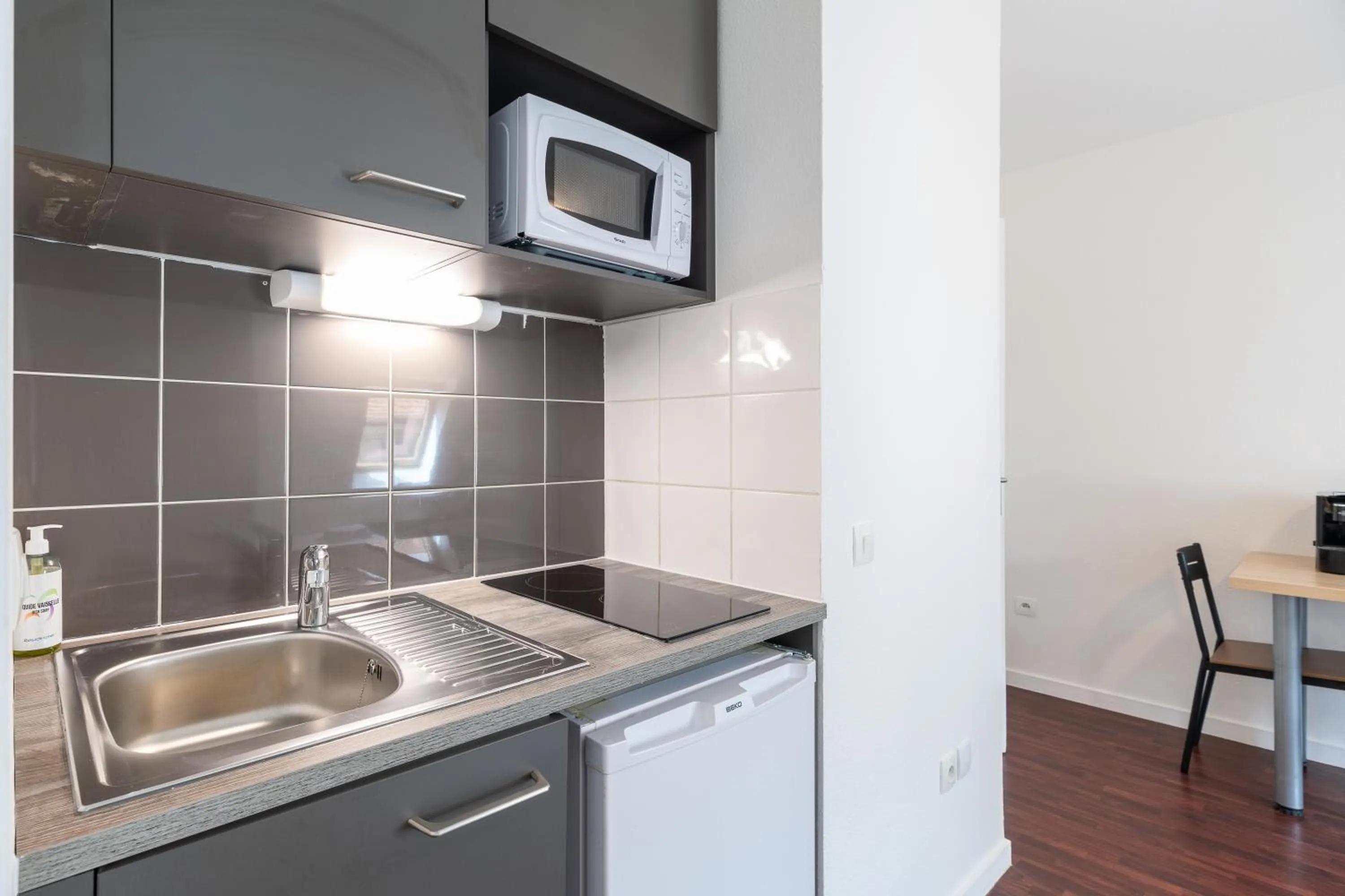 Kitchen or kitchenette in Residhotel St Etienne Centre
