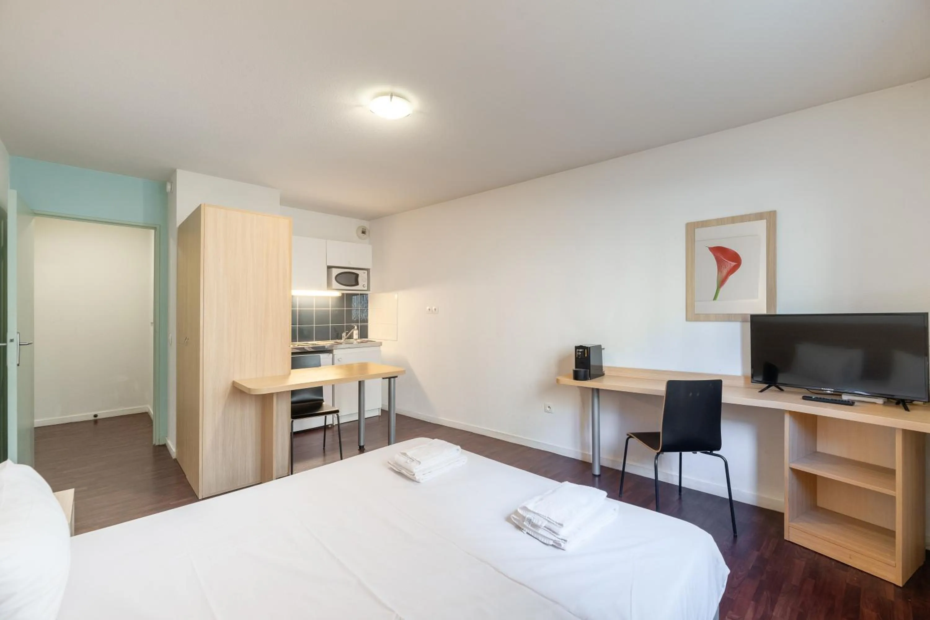 Photo of the whole room, Bed in Residhotel St Etienne Centre