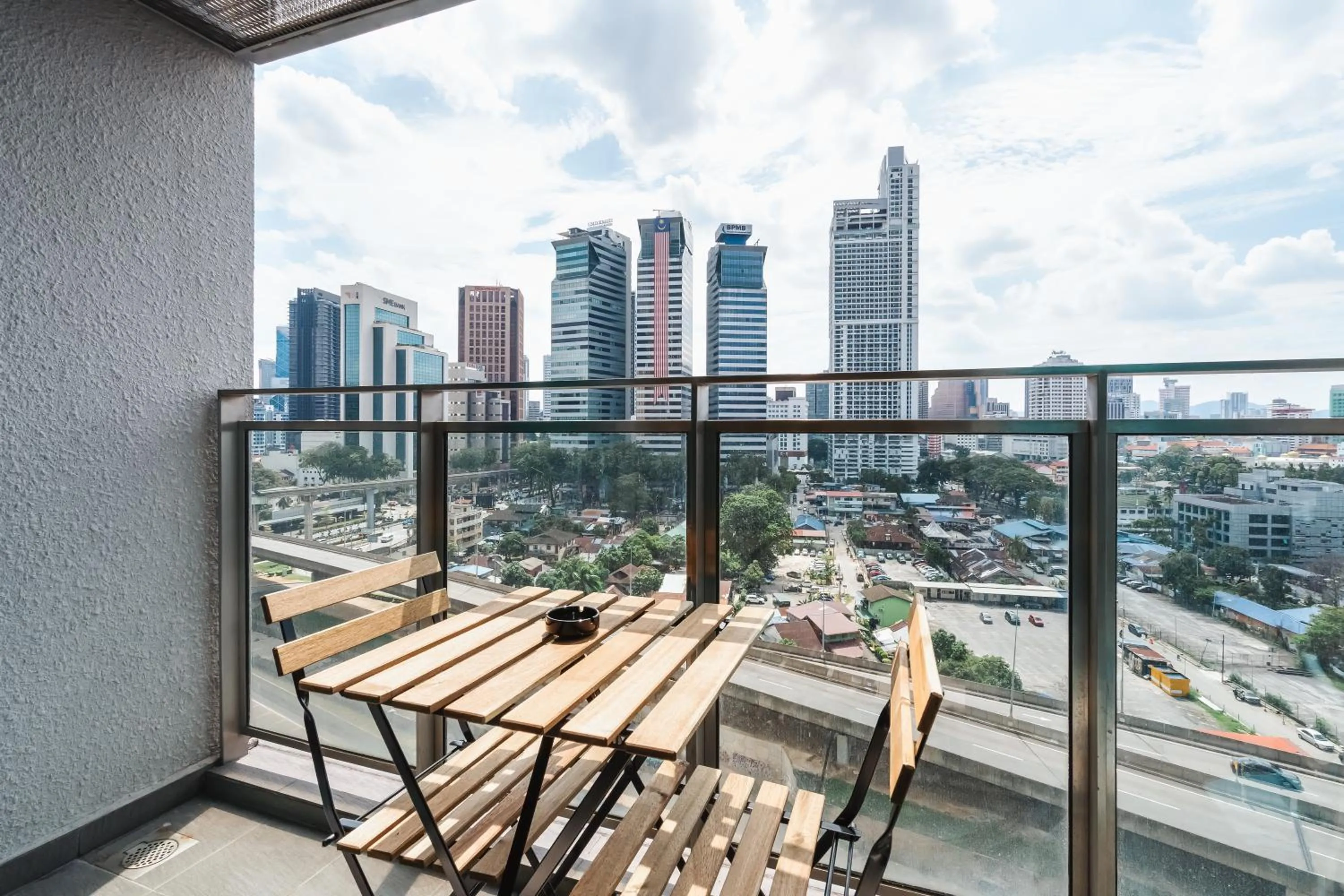 Balcony/Terrace in Summer Suites KLCC Apartments by soulasia