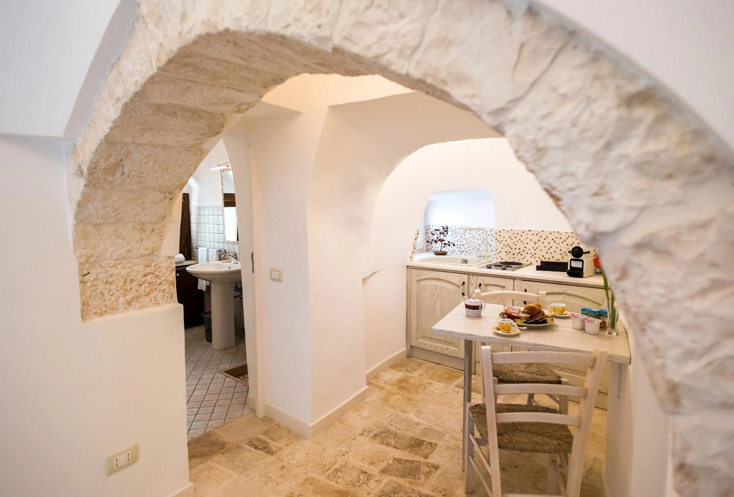 Dining area in Trullo Giardino Fiorito