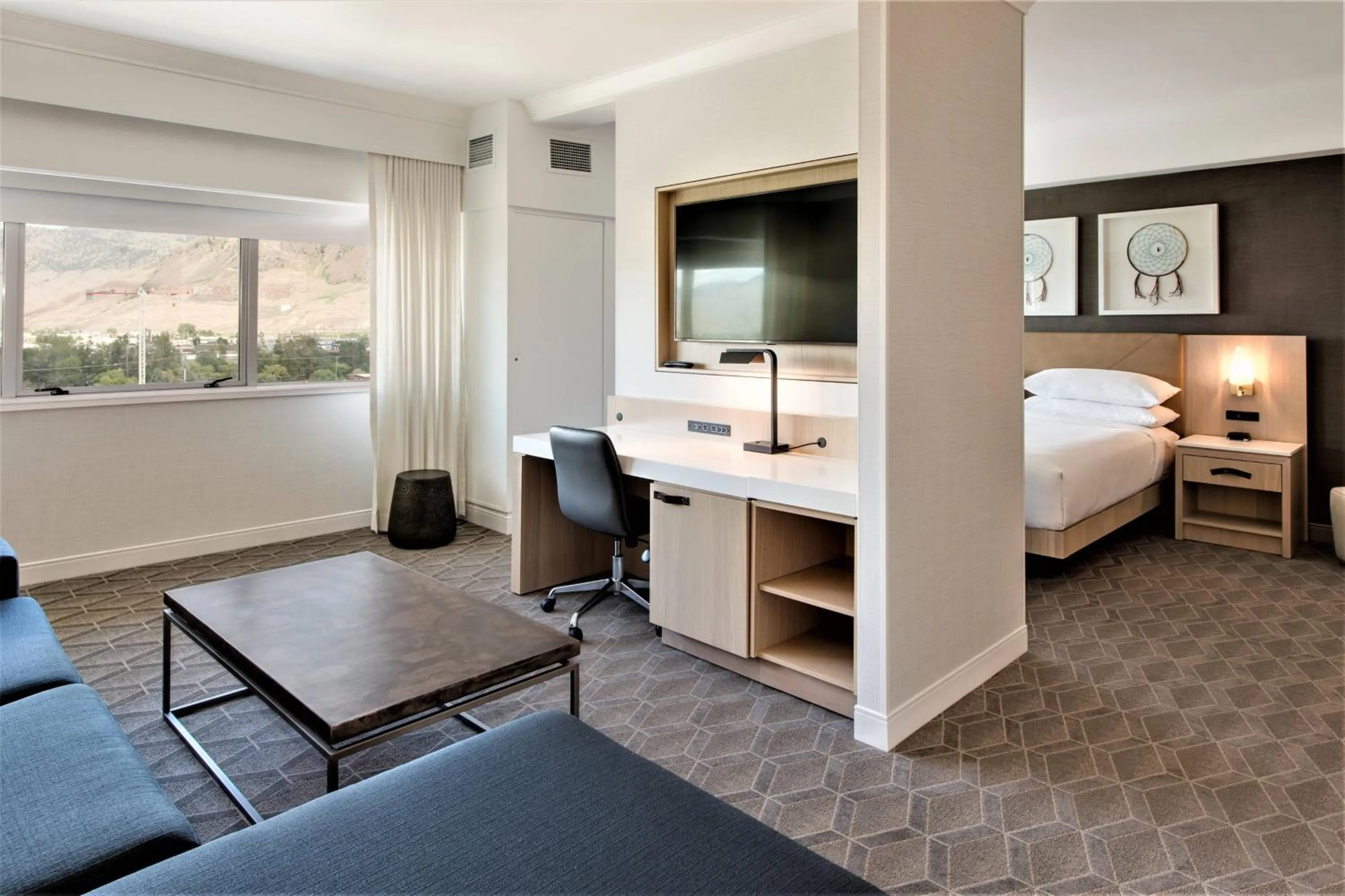 Living room, Bed in Delta Hotels by Marriott Kamloops