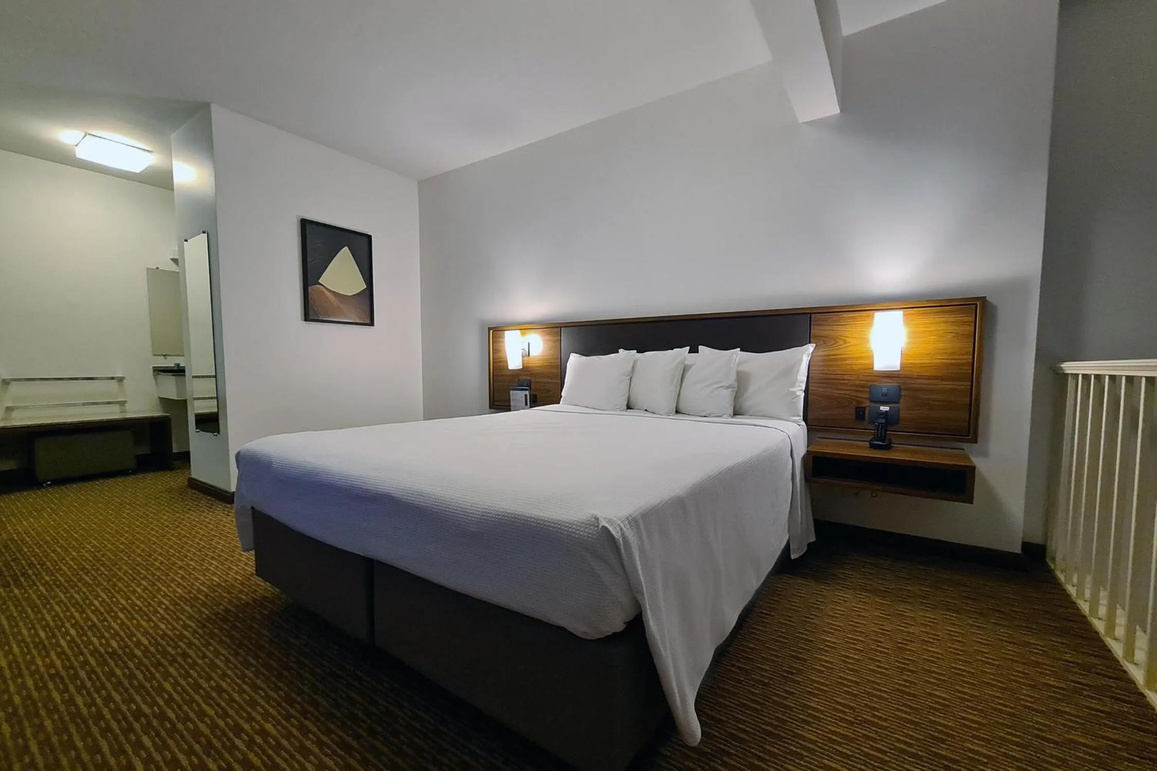 Bed in Hotel Deville Curitiba