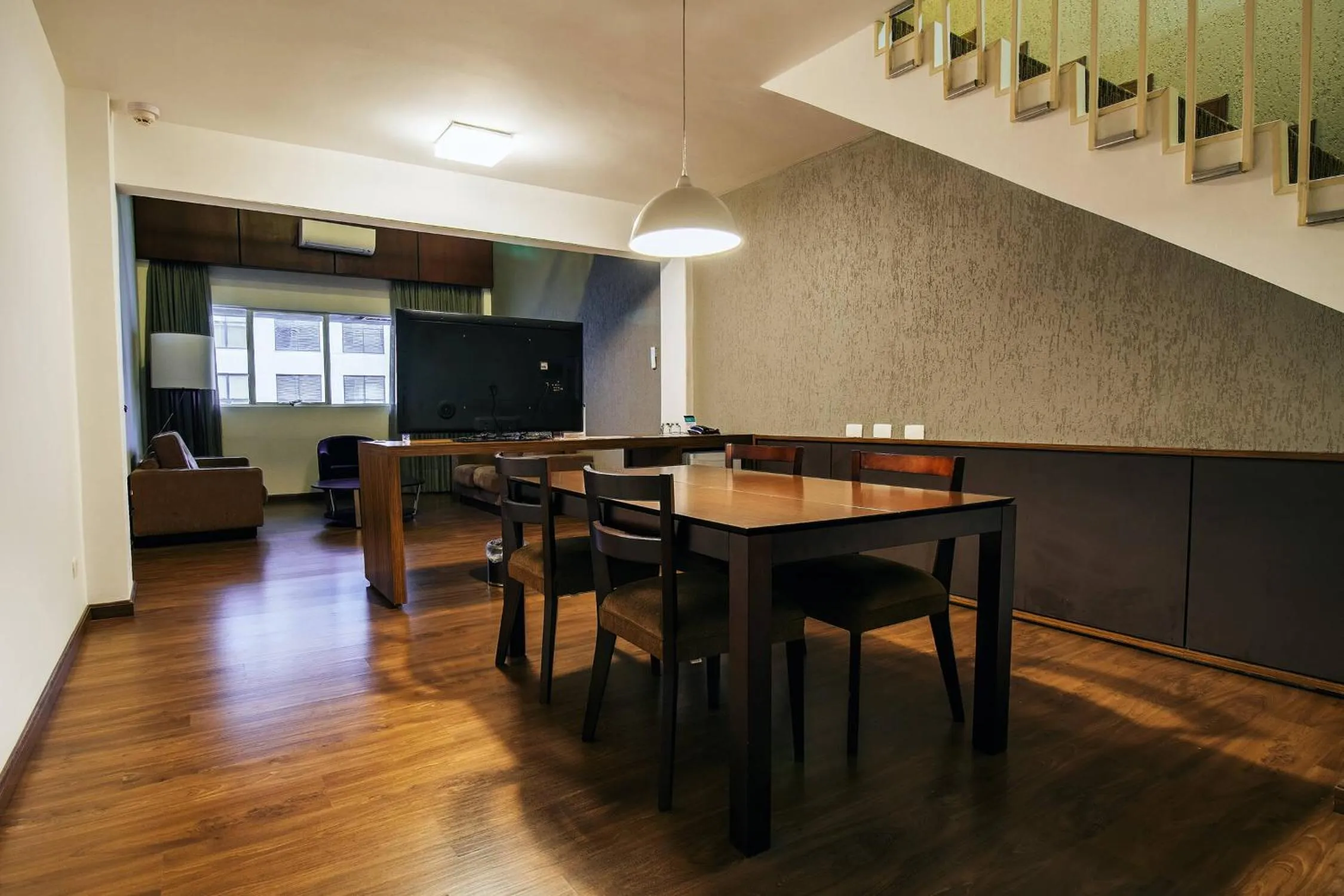 Living room in Hotel Deville Curitiba