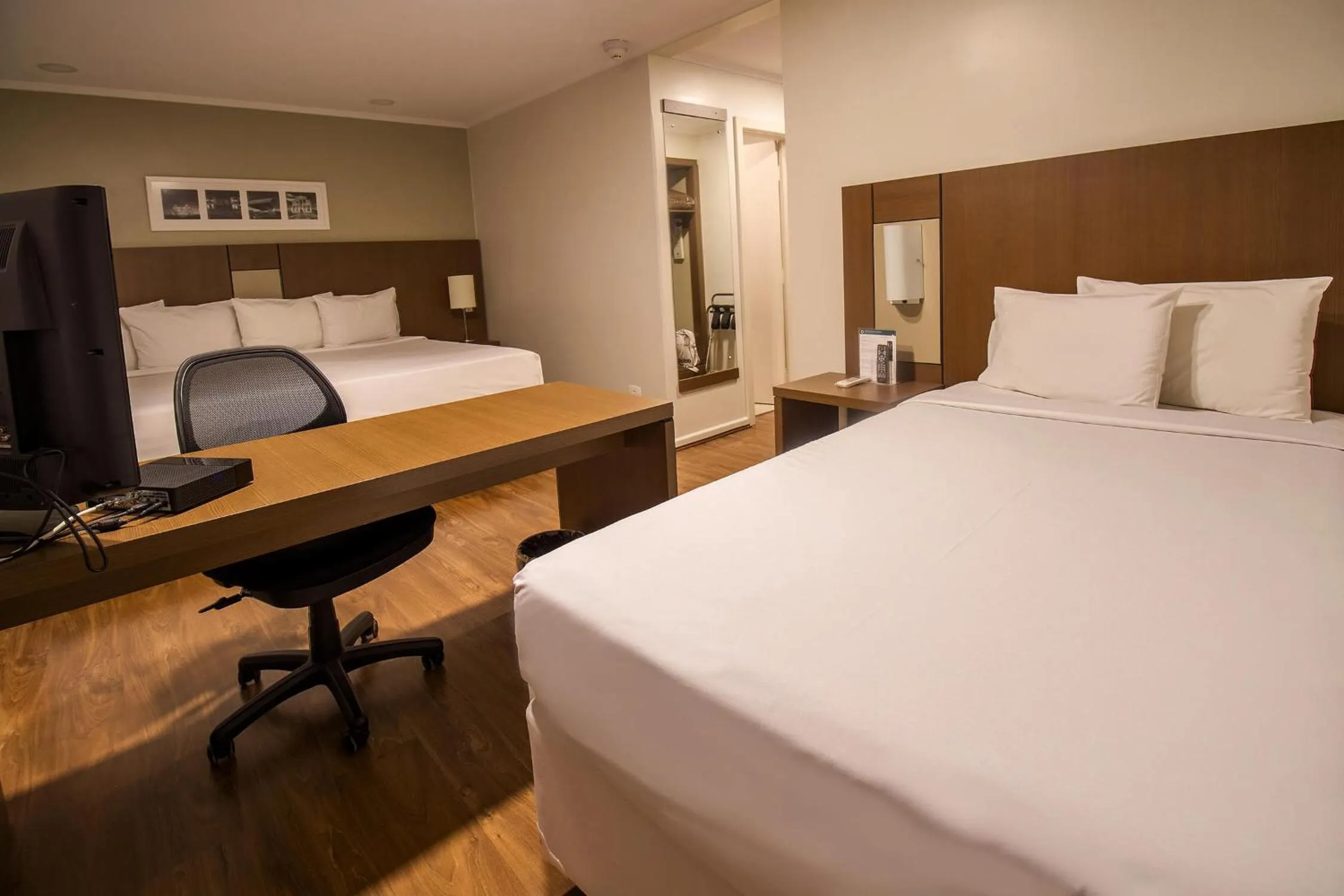 Bed in Hotel Deville Curitiba