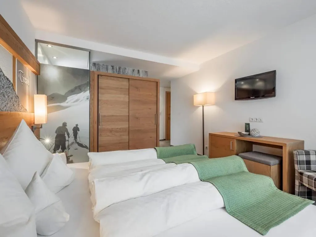 Bed in Hotel Sportpension Carinthia