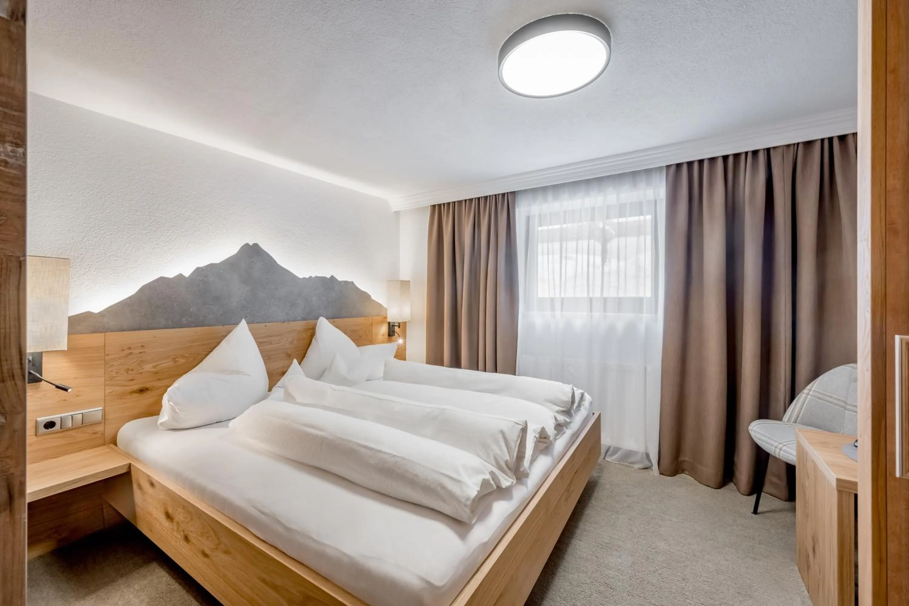 Bed in Hotel Sportpension Carinthia