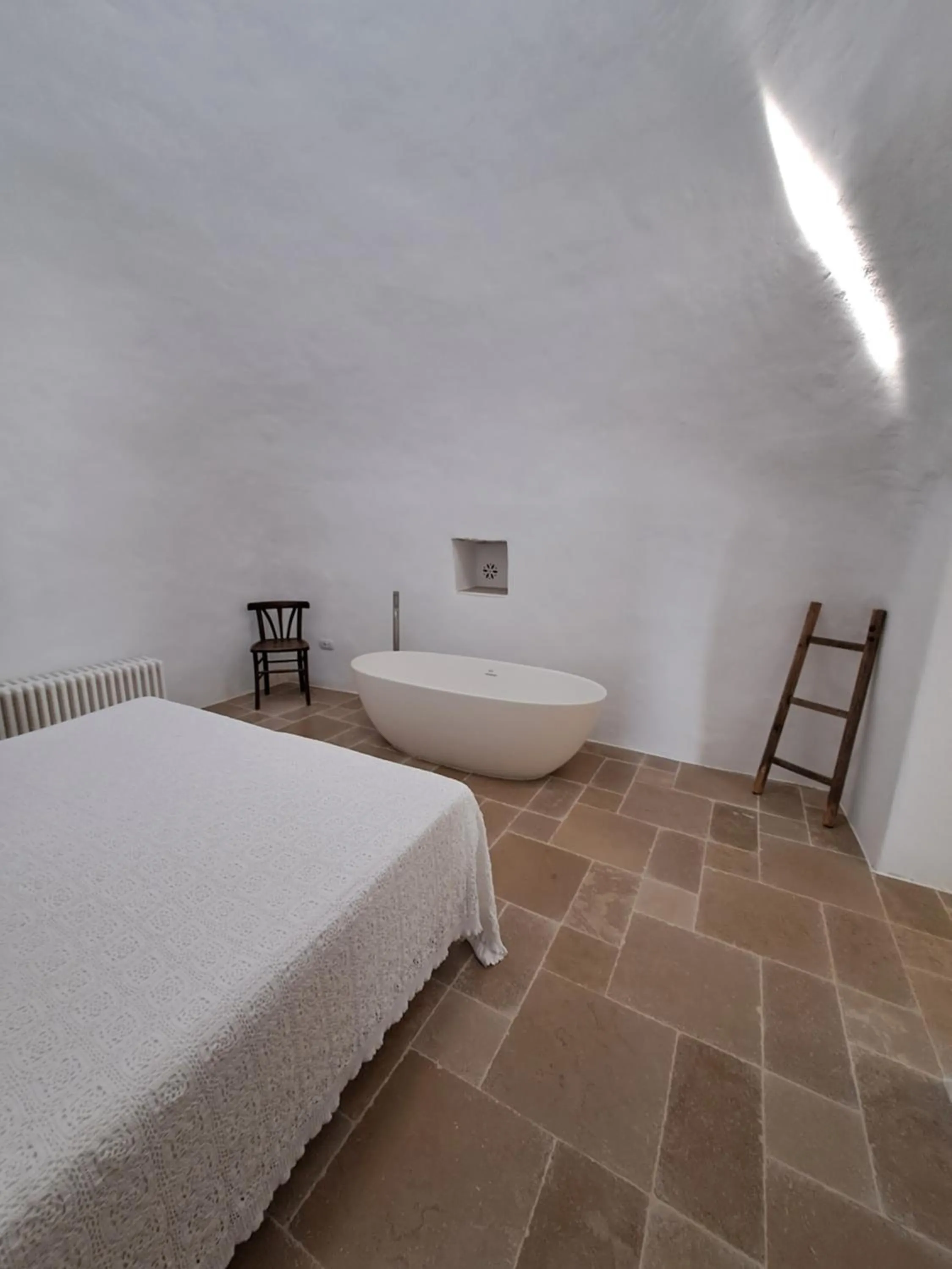 Photo of the whole room, Bed in Pietra Pesara