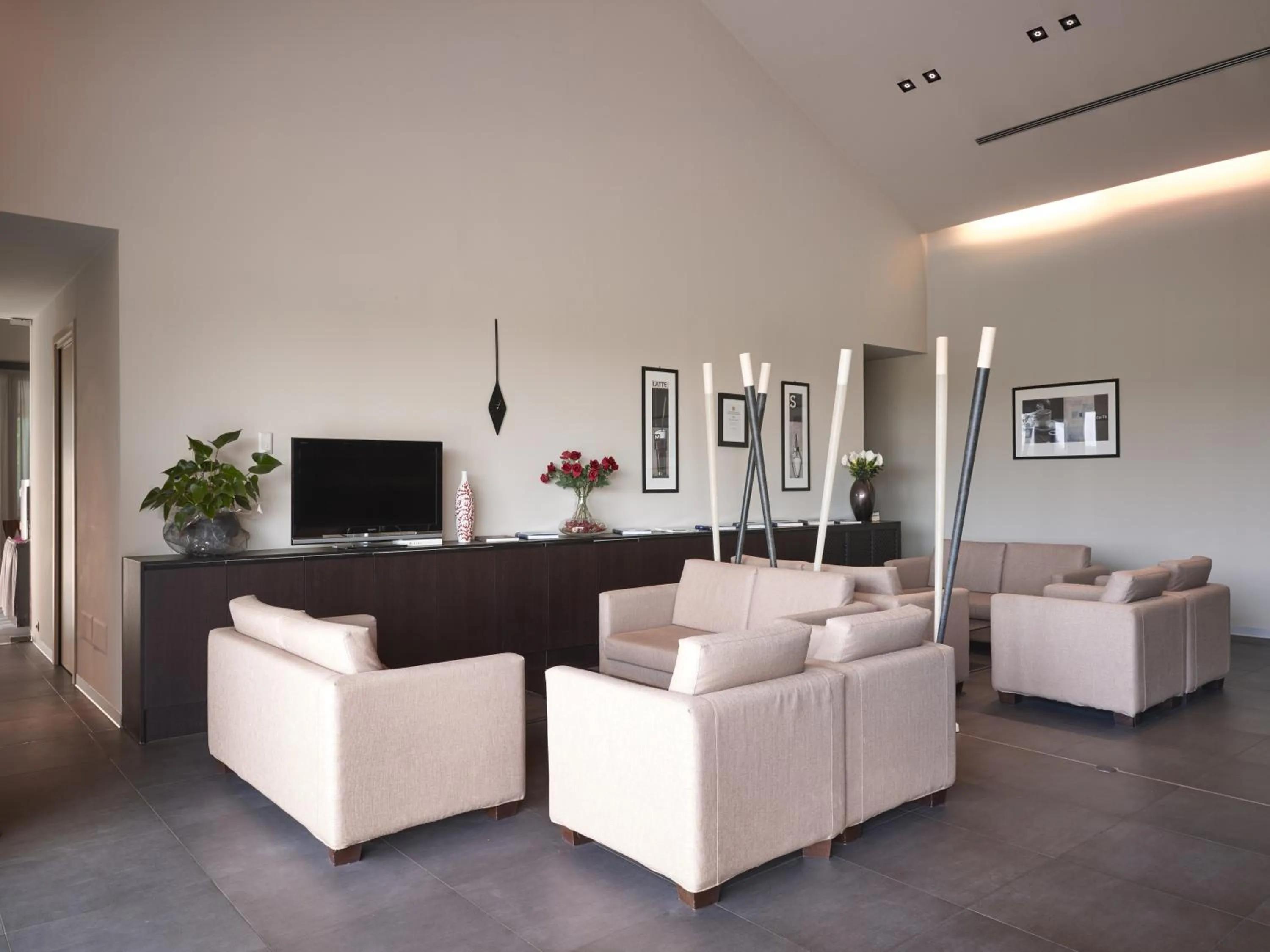 Communal lounge/ TV room in Casalgrande Hotel